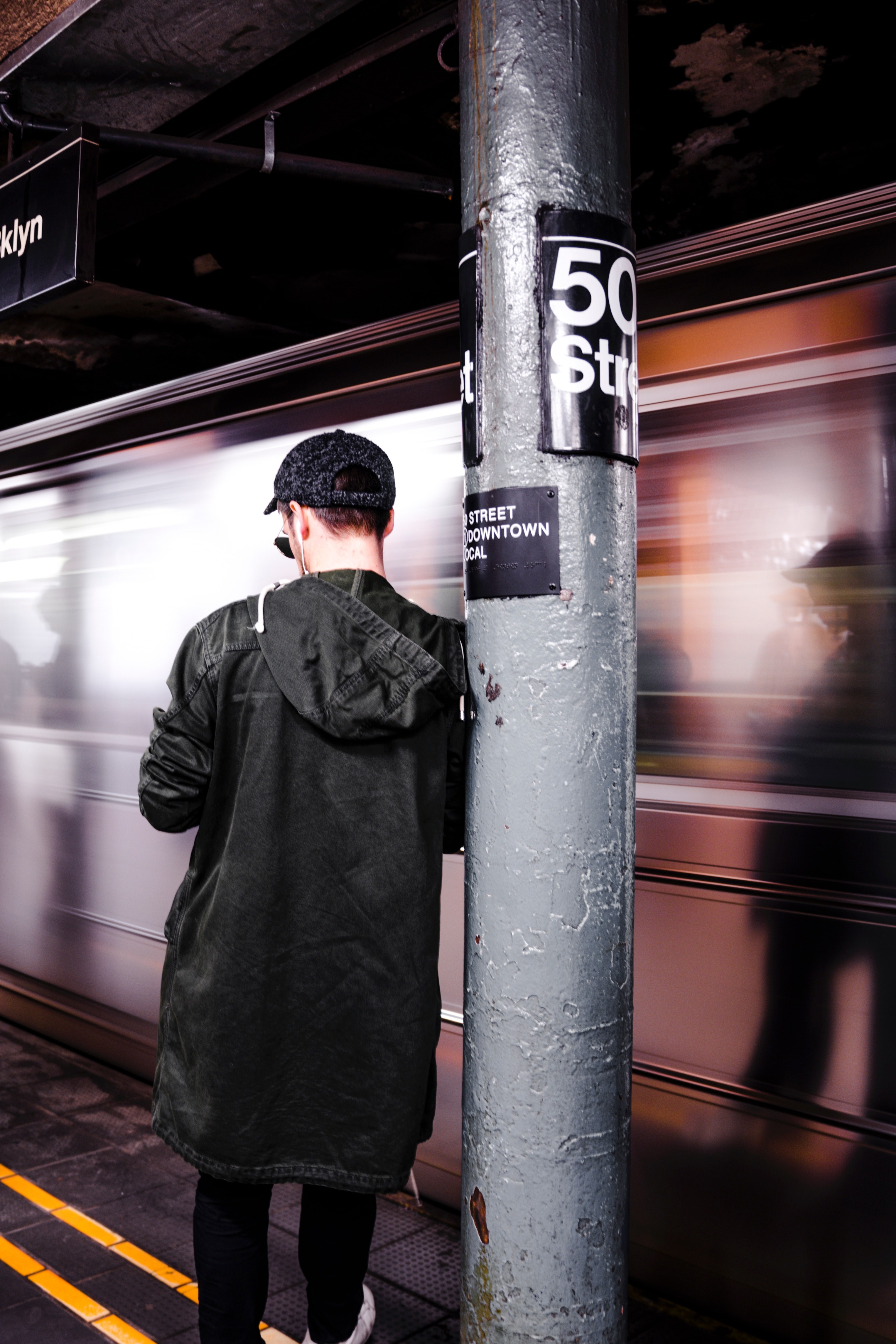 person waiting at a subway stop as the train speeds by, in motion 4k, Phone HD Wallpaper