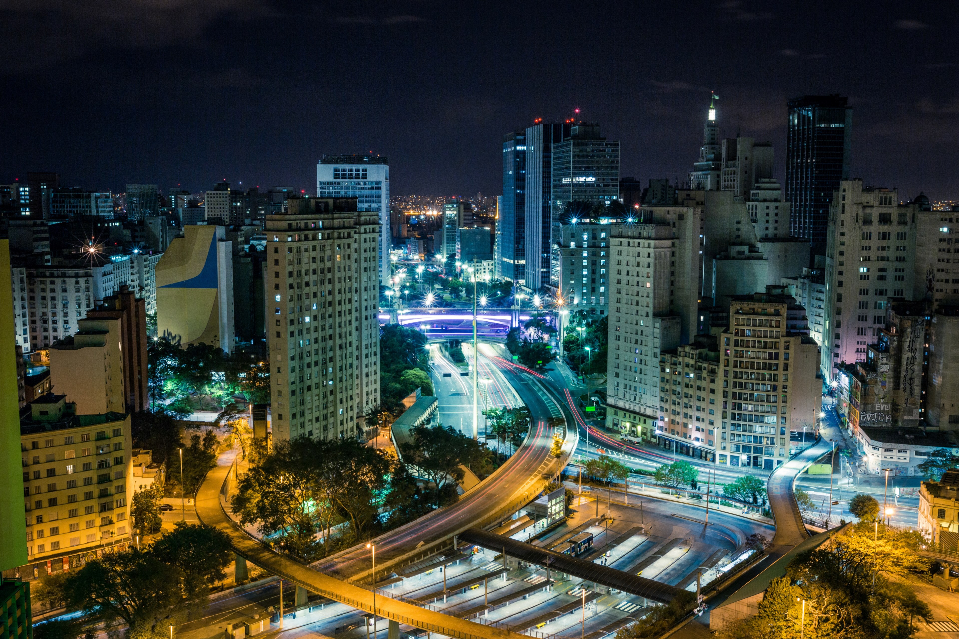 a high long exposure shot of light trails in a bustling city, night city traffic 4k, HD Wallpaper