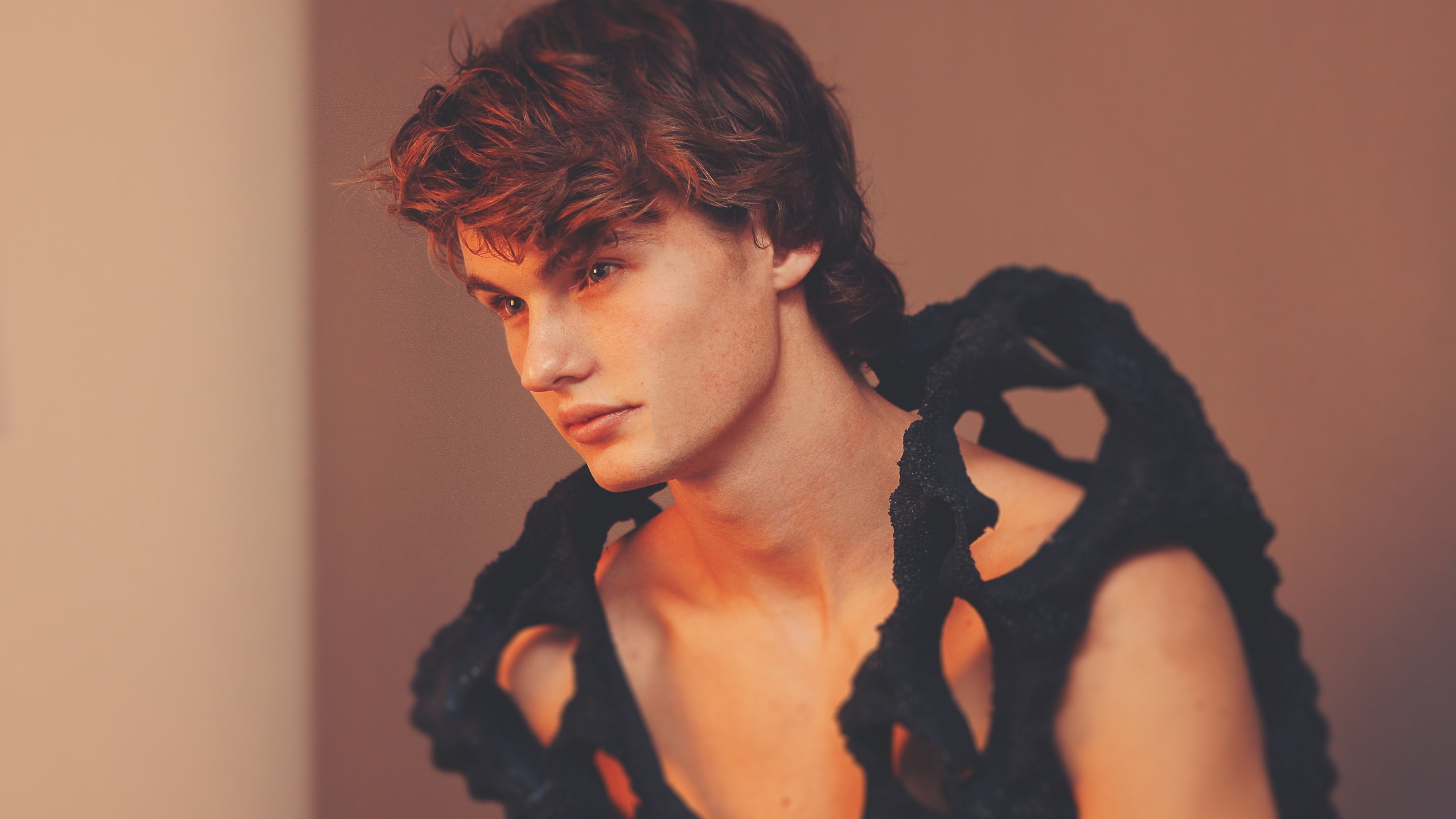 a male model shot by nick karvounis photography wears an open black garment revealing his chest, male model in open garment 4k, HD Wallpaper
