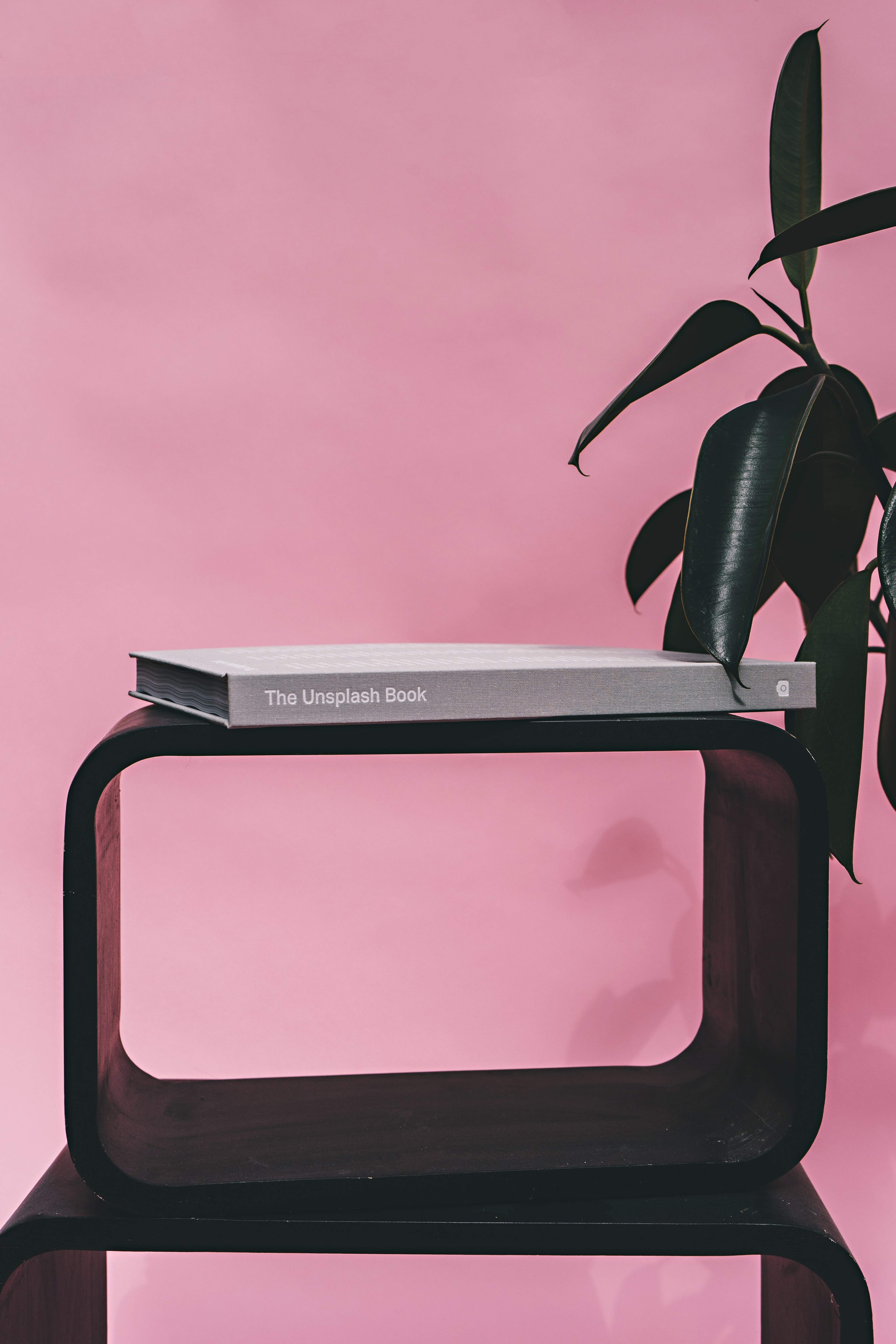 a cube shelf with a book on top next to an indoor plant, _cube shelf 4k, Phone HD Wallpaper