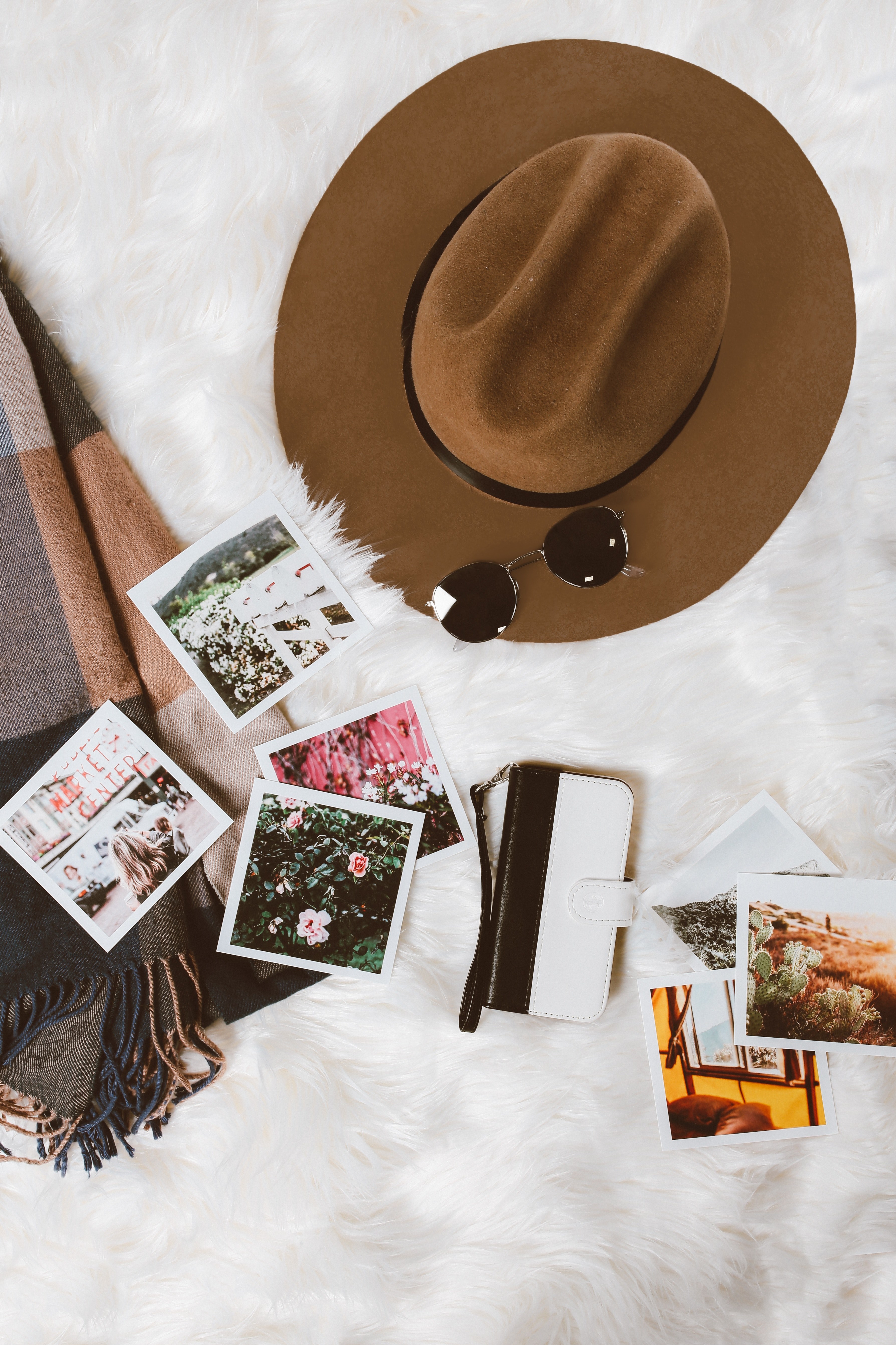 a flatlay with a brown hat sunglasses photo prints and a blanket, hat and photos in flatlay 4k, Phone HD Wallpaper