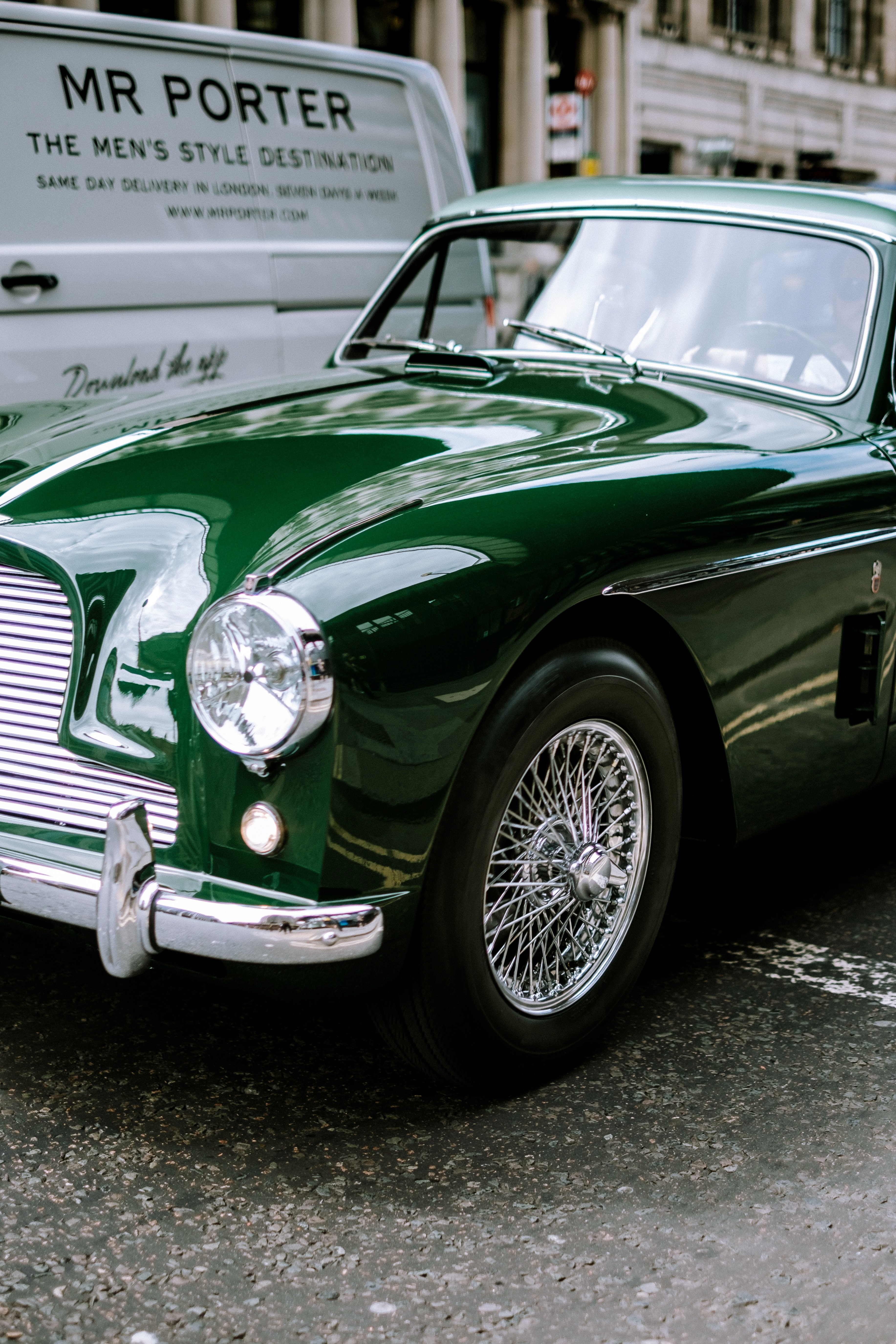 shiny green vintage car parked in front of white truck, green with envy 4k, Phone HD Wallpaper