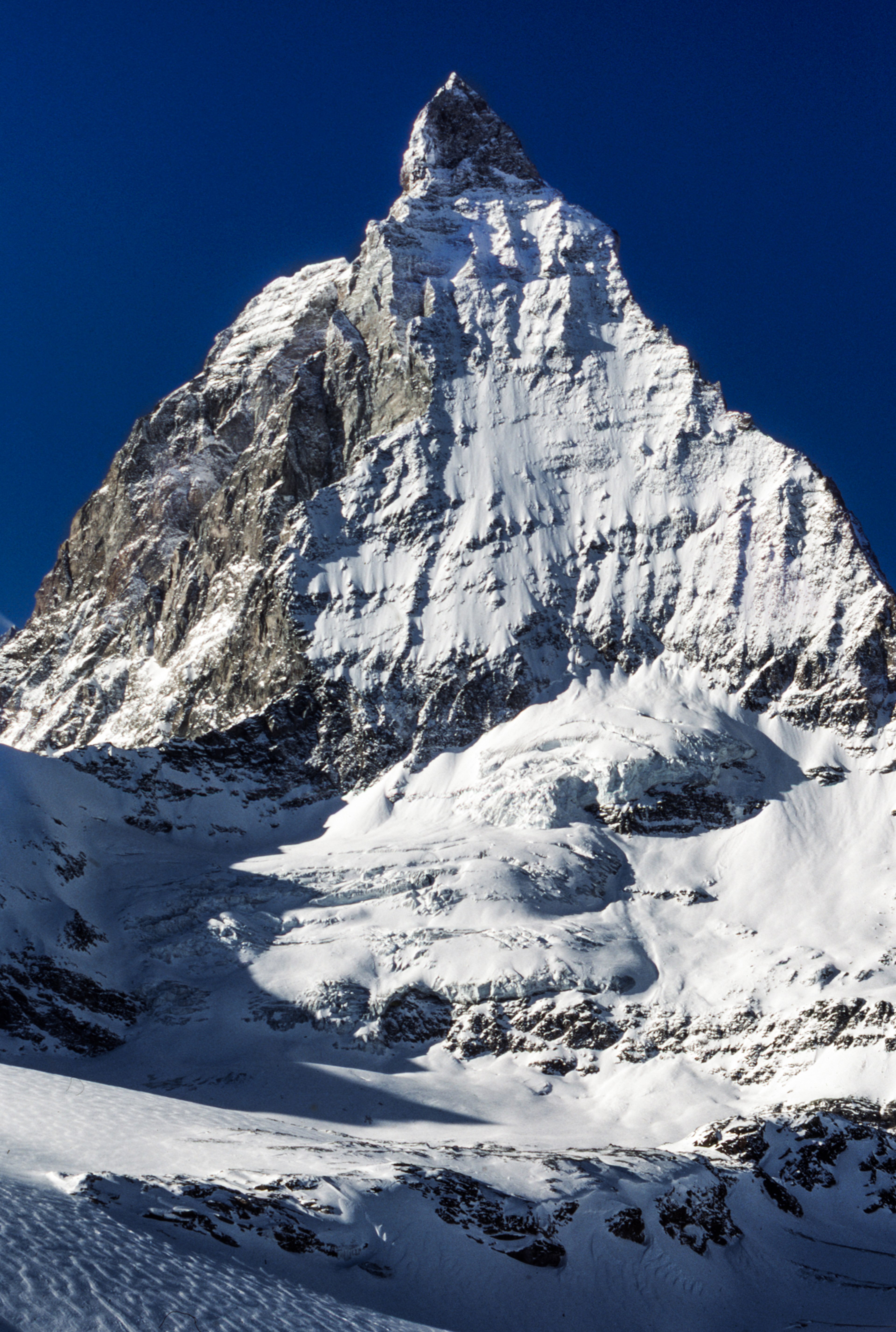 a look up at the peak of a snow covered mountain in zermatt switzerland, snow mountain in zermatt 4k, Phone HD Wallpaper