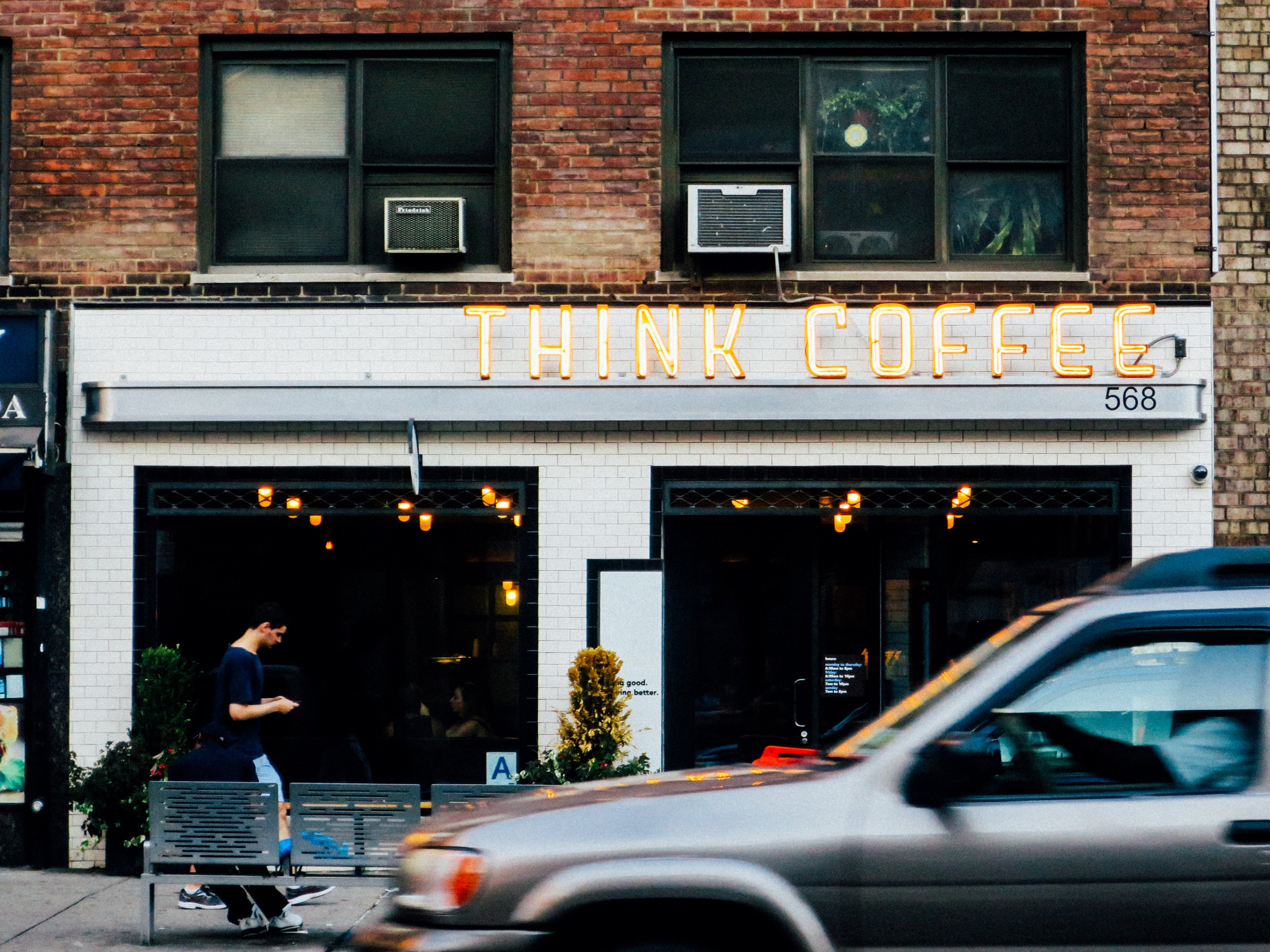a yellow think coffee neon over the entrance to a coffee shop, yellow think coffee neon 4k, HD Wallpaper
