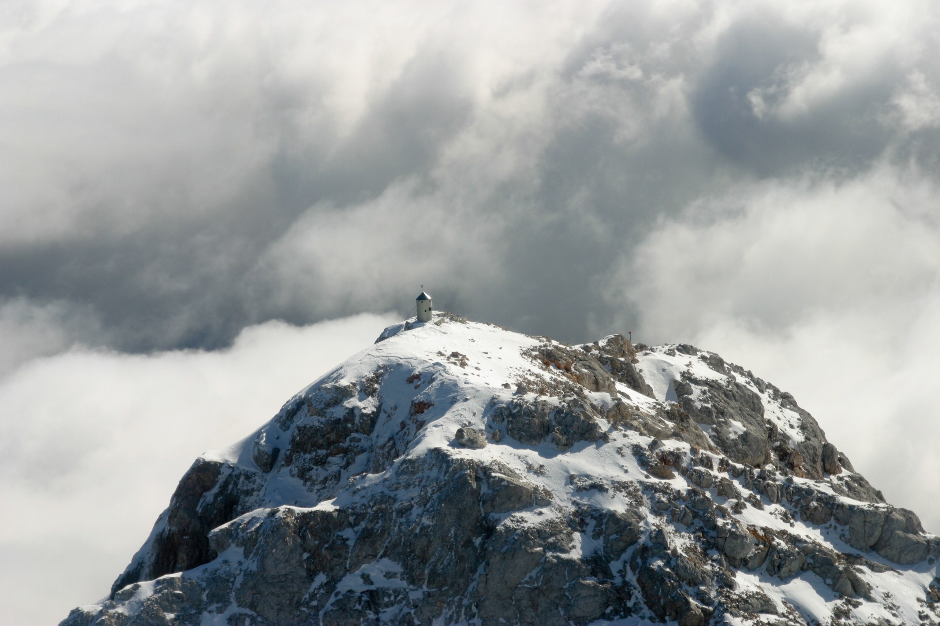 on top of a snow covered mountain with stormy clouds in triglav, _mount triglav 4k, HD Wallpaper