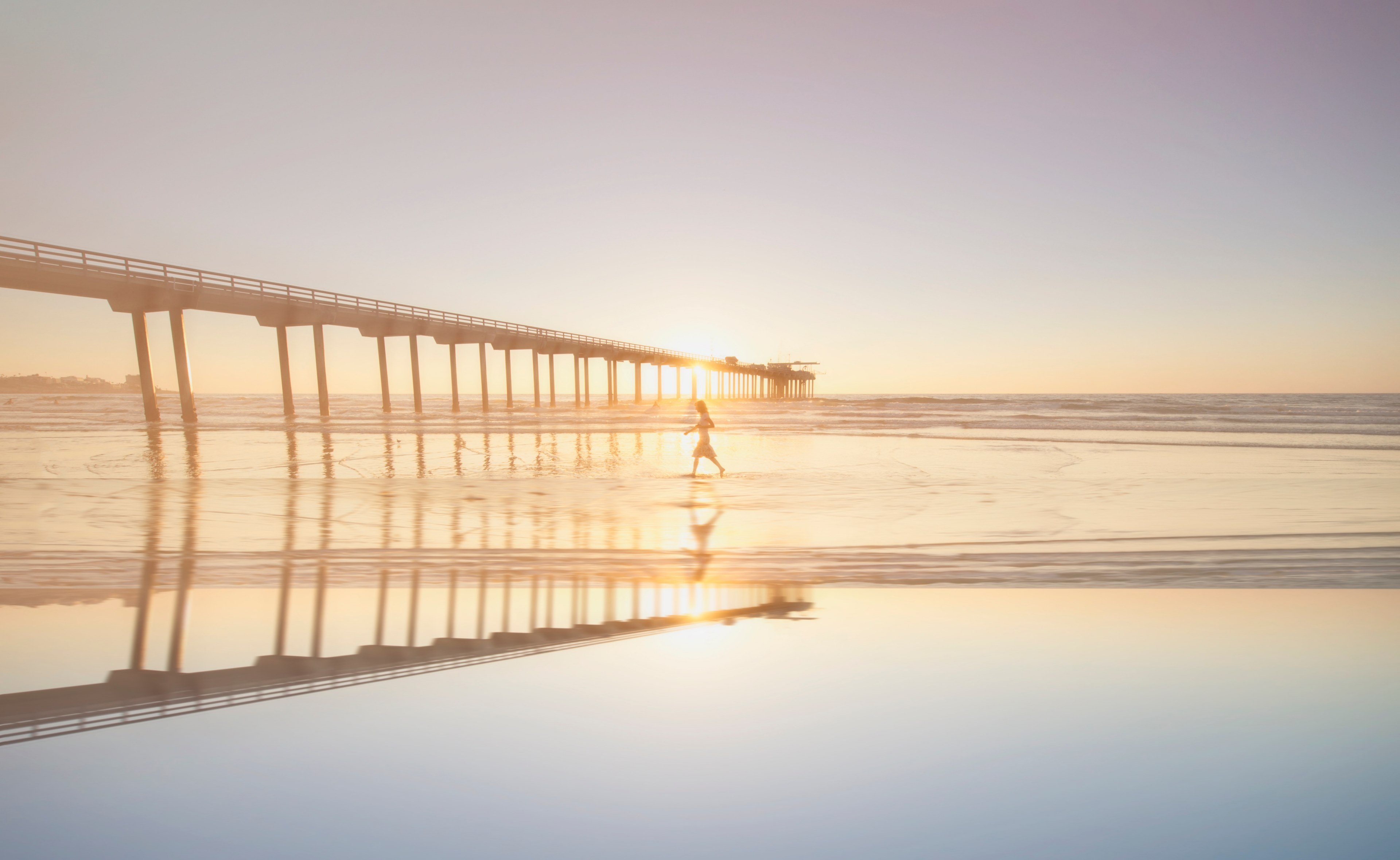 woman walking on the wet sand beach by the pier at sunset in san diego, woman walking on a beach 4k, HD Wallpaper