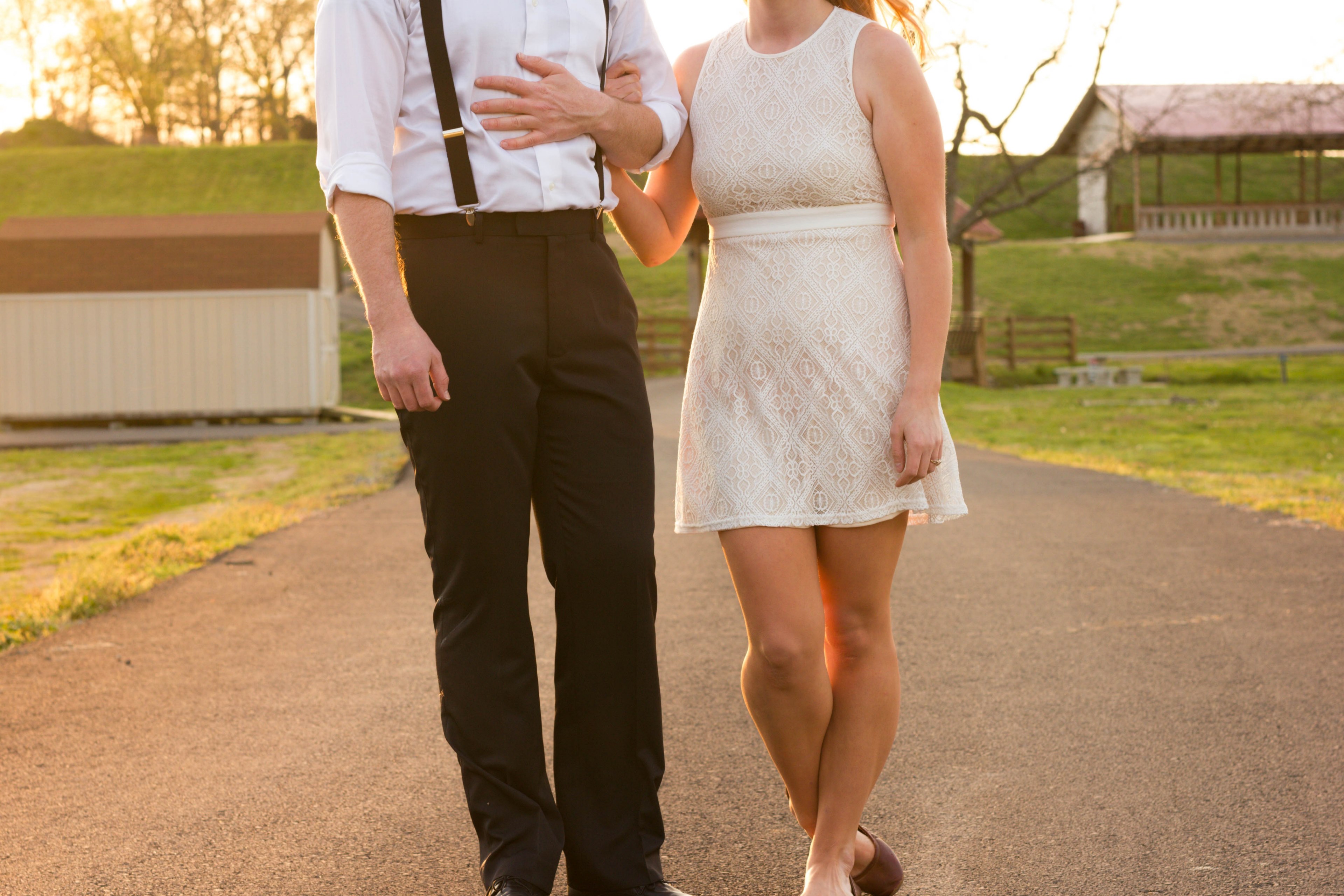 a couple in formal wear stands next to each other on a path in a park in chattanooga, young couple in chattanooga 4k, HD Wallpaper