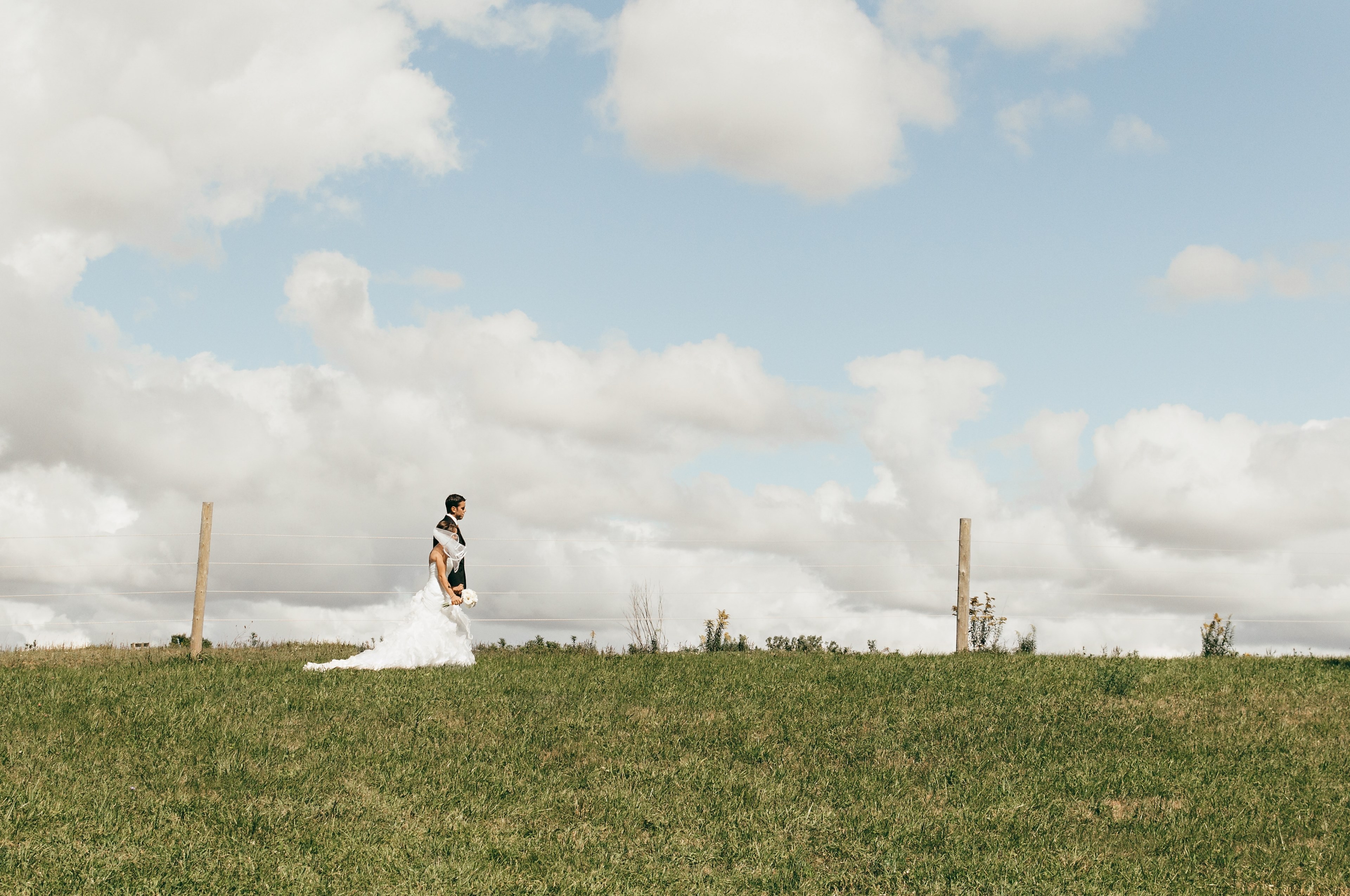bride and groom walking beneath the clouds in london, london wedding blue sky clouds 4k, HD Wallpaper