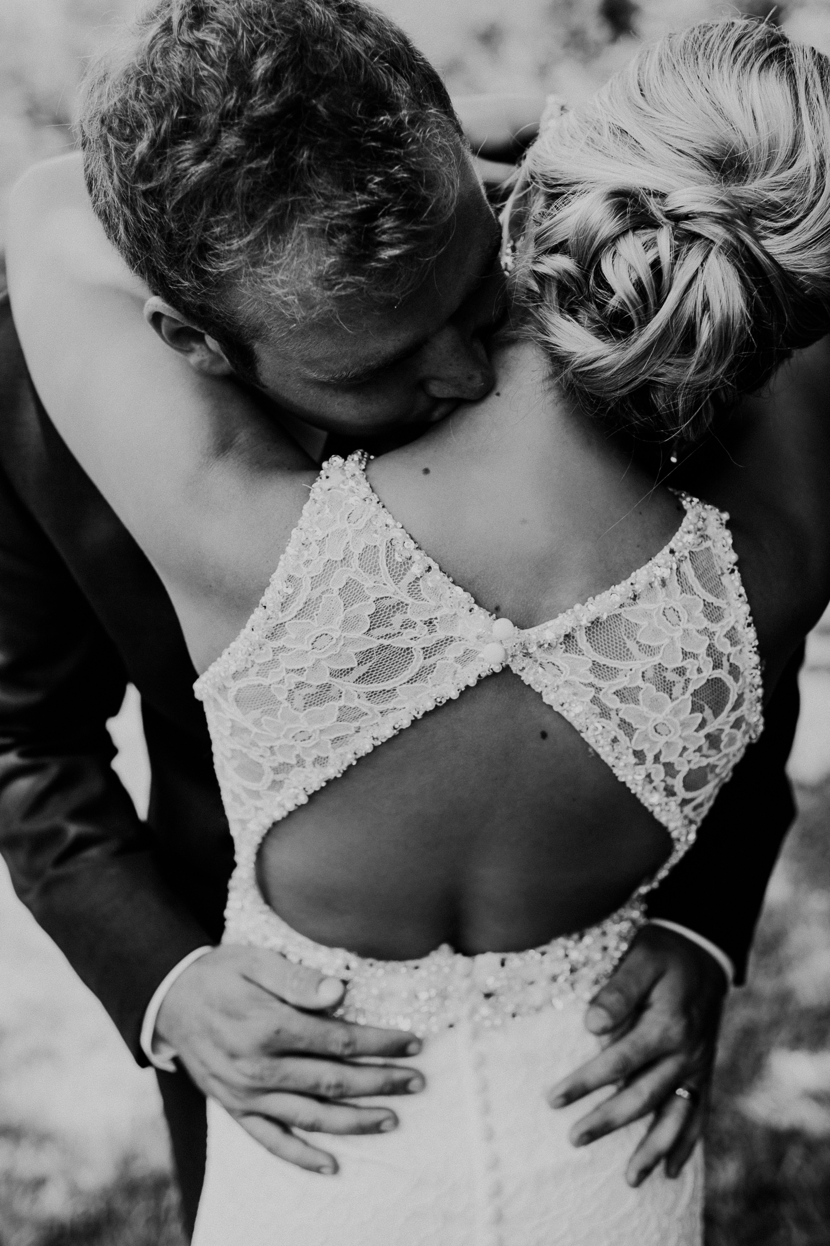 couple in black and white hugs on their wedding day the brides back faces the camera, _newlywed embrace ankeny 4k, Phone HD Wallpaper