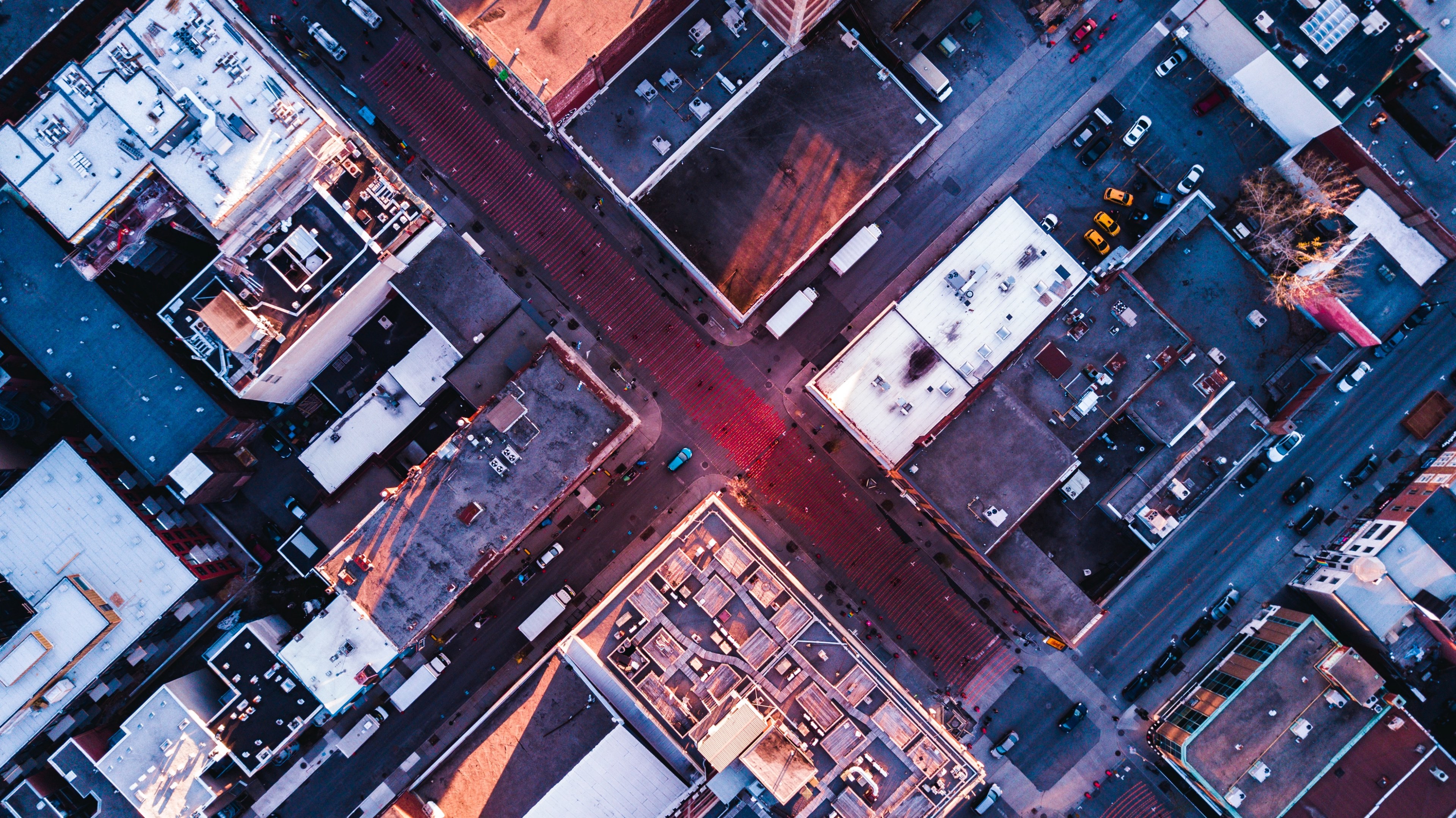 a drone shot of building roofs and parking lots in quebec, free fall 4k, HD Wallpaper