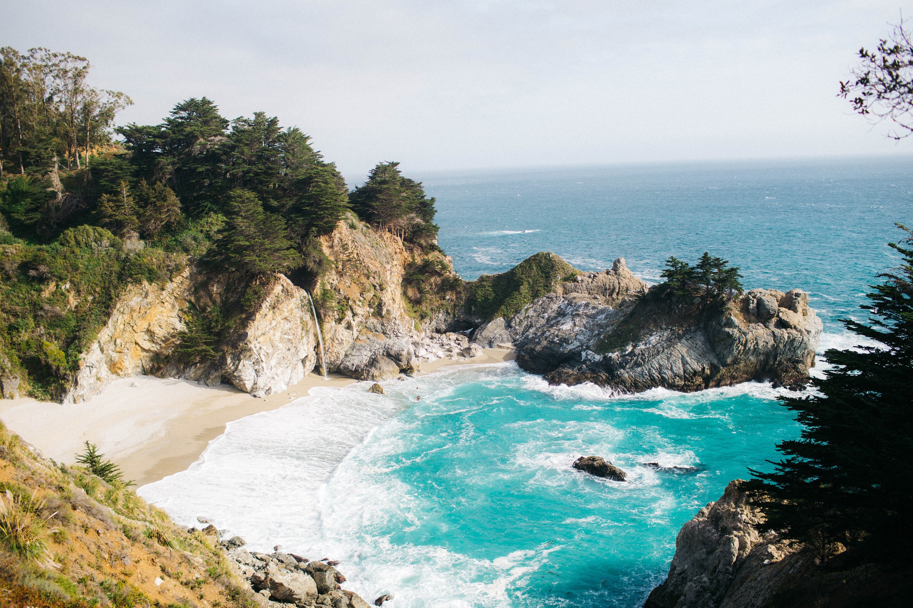 beautiful landscape view of bright beach shore with rocky cliff and flowing blue sea, amazing beach rock 4k, HD Wallpaper