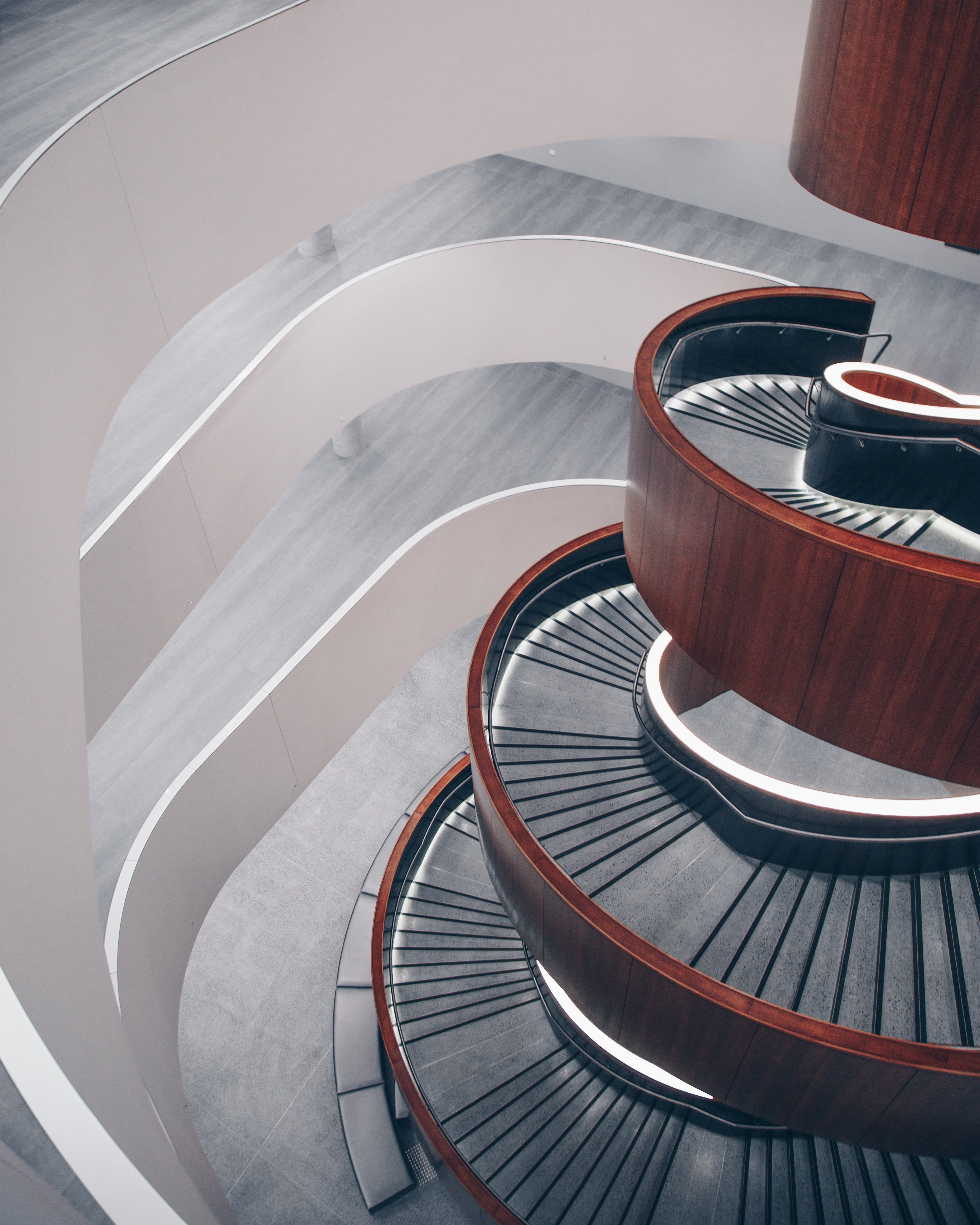 an empty spiral staircase in a modern building in sydney, curves 1 4k, Phone HD Wallpaper