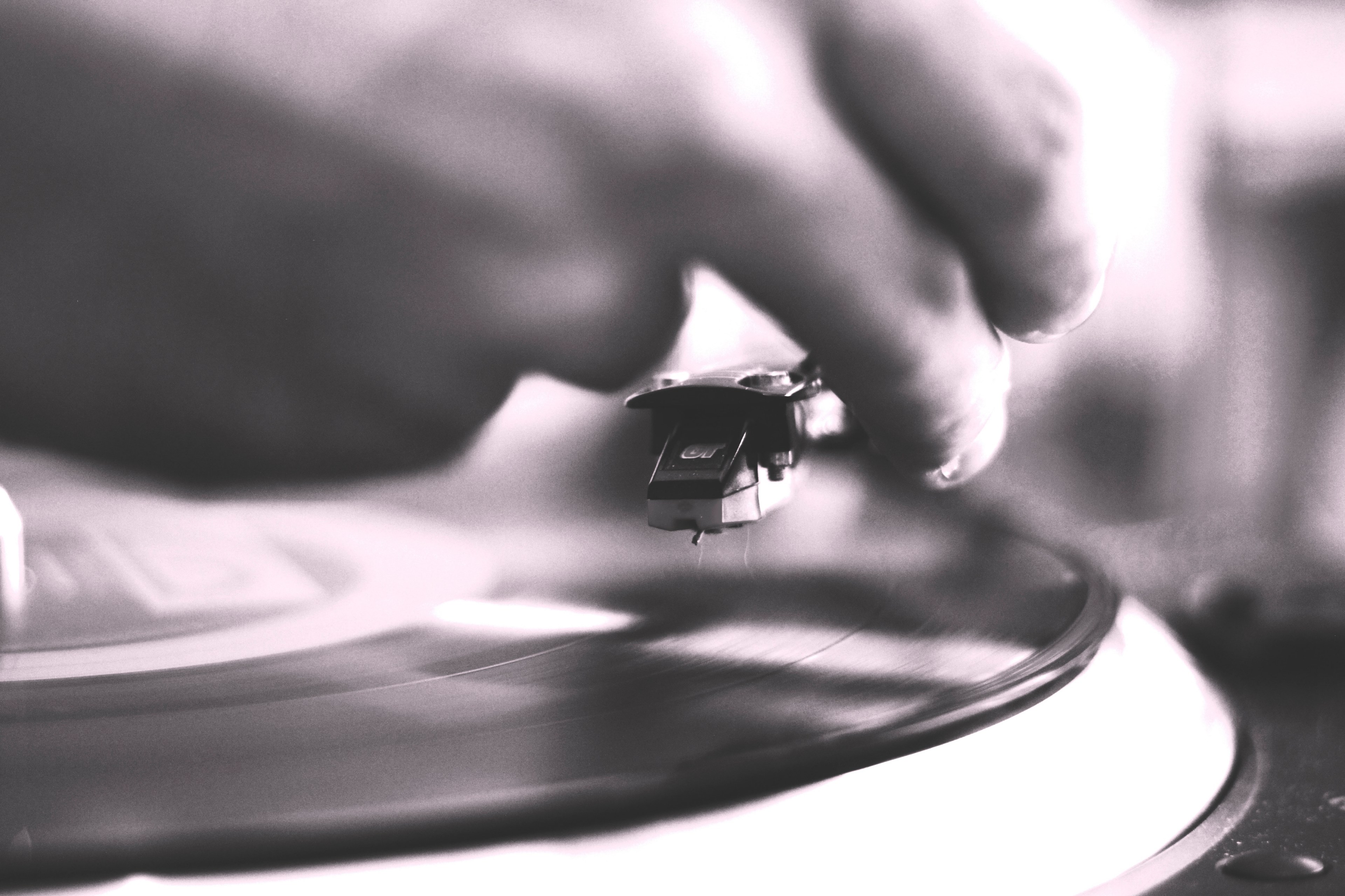 unfocused black and white shot of hand putting needle on a record on a turntable, visit to the vinyl shop 4k, HD Wallpaper