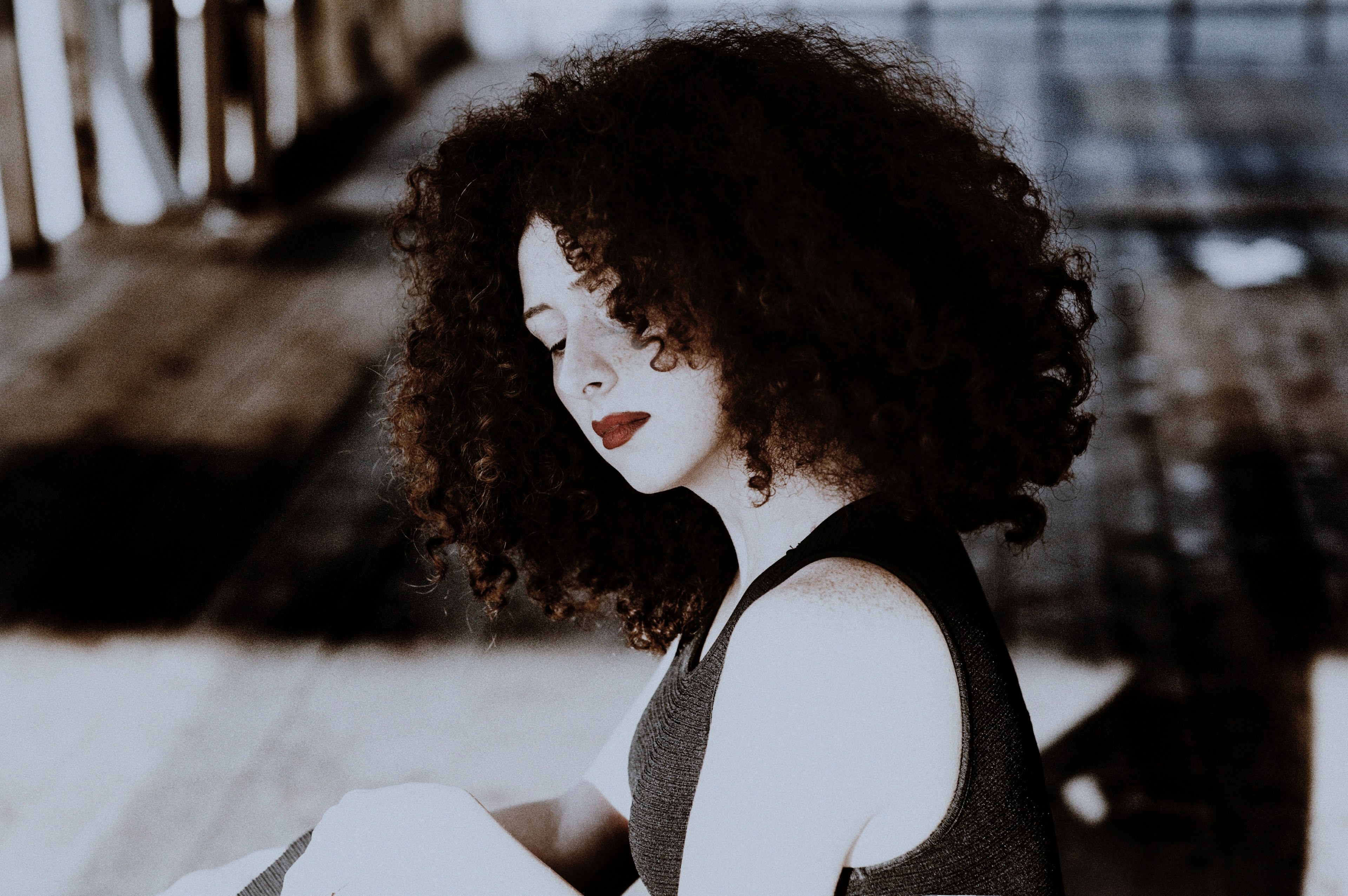 portrait of a woman with curly dark hair and dark red lipstick, red and white with curlyhair 4k, HD Wallpaper