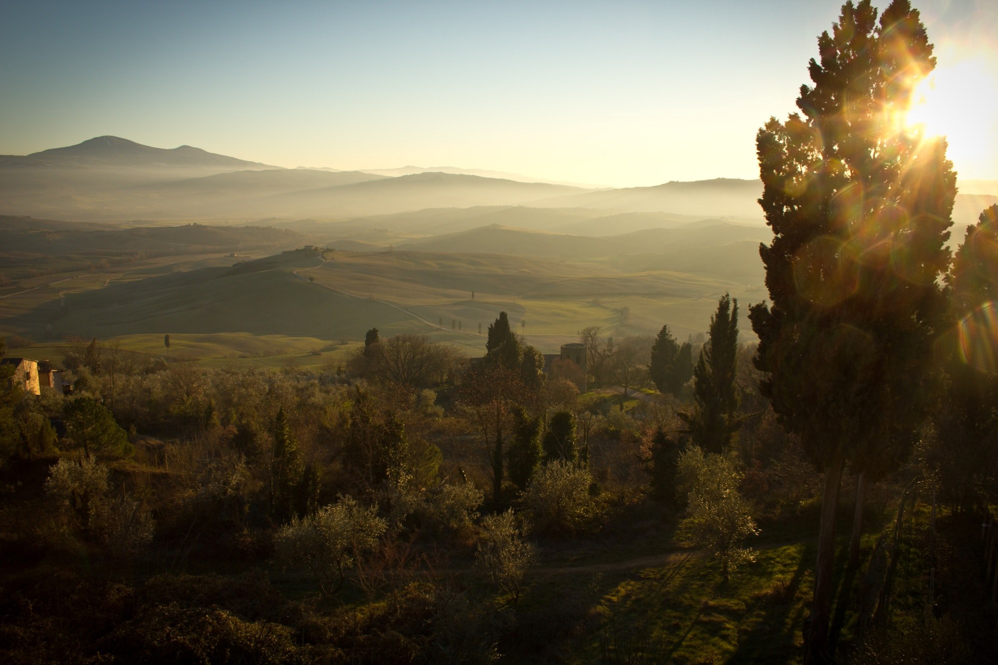 a picturesque landscape with a fertile valley under the setting sun, looking out over the val dorcia in italy 4k, HD Wallpaper