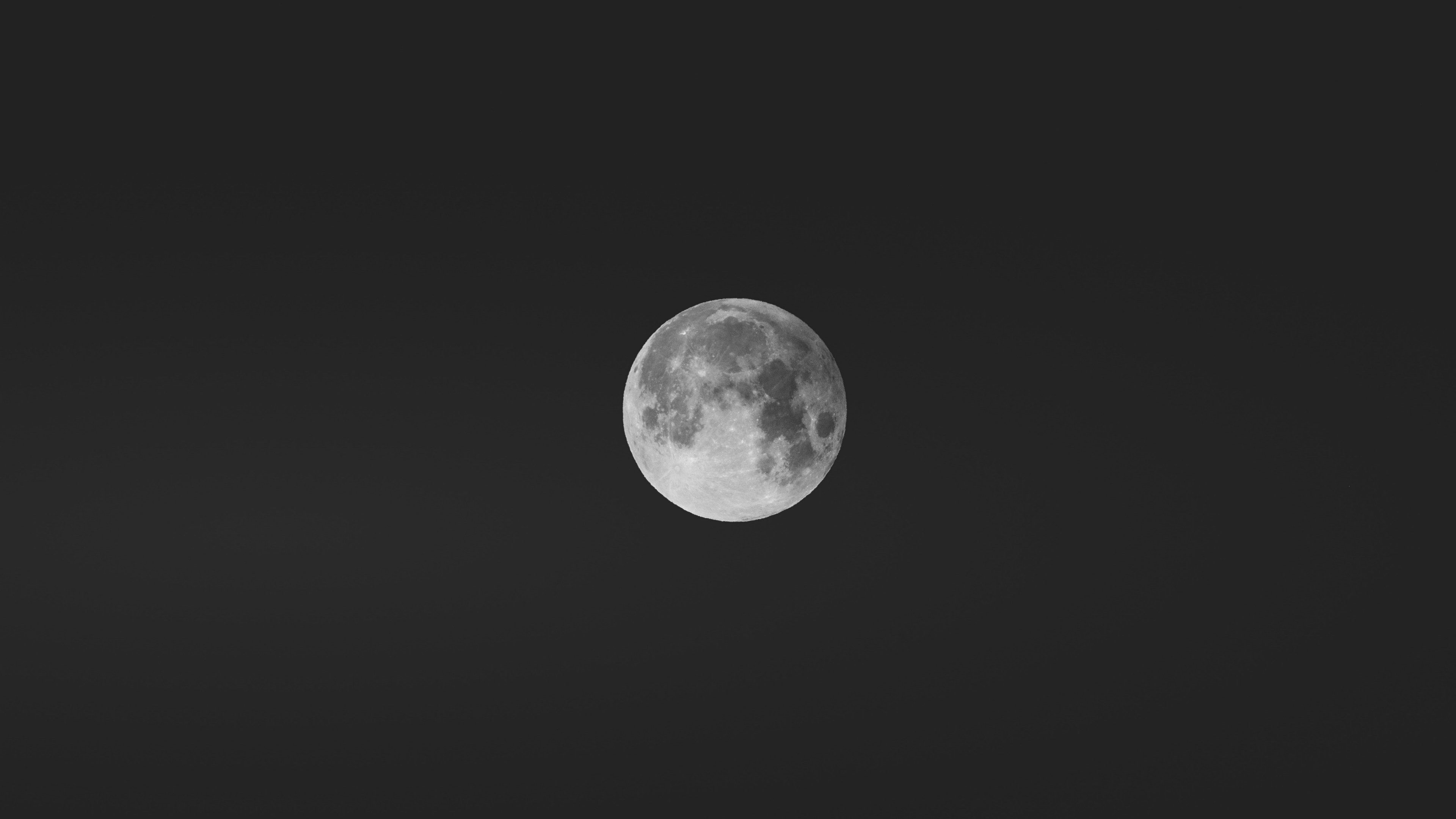a focused shot on a full moon in a dark night sky in innsbruck austria, the perfect moment 4k, HD Wallpaper