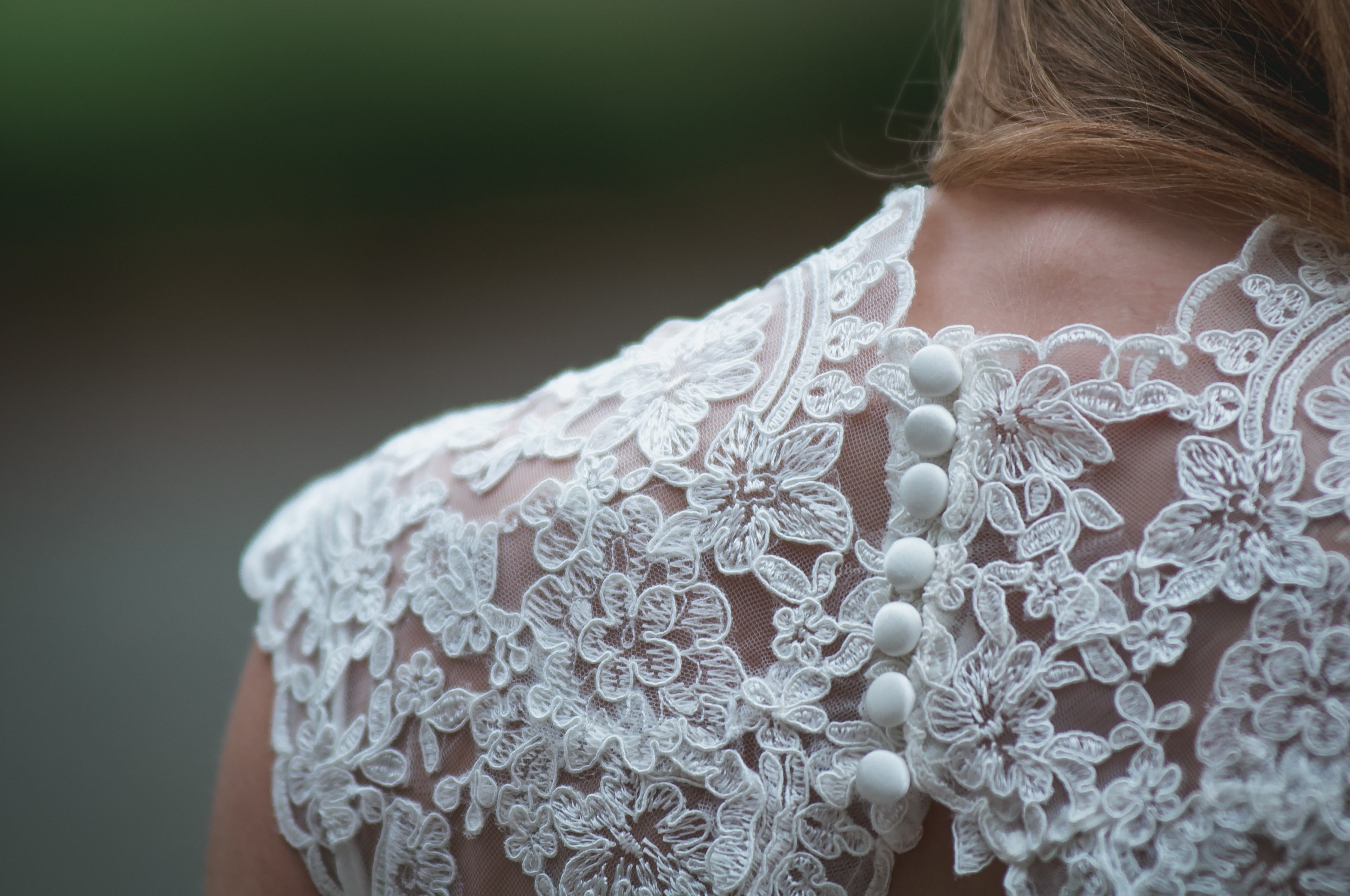 close up of a woman wearing a lace button up wedding dress, a brides gown 4k, HD Wallpaper