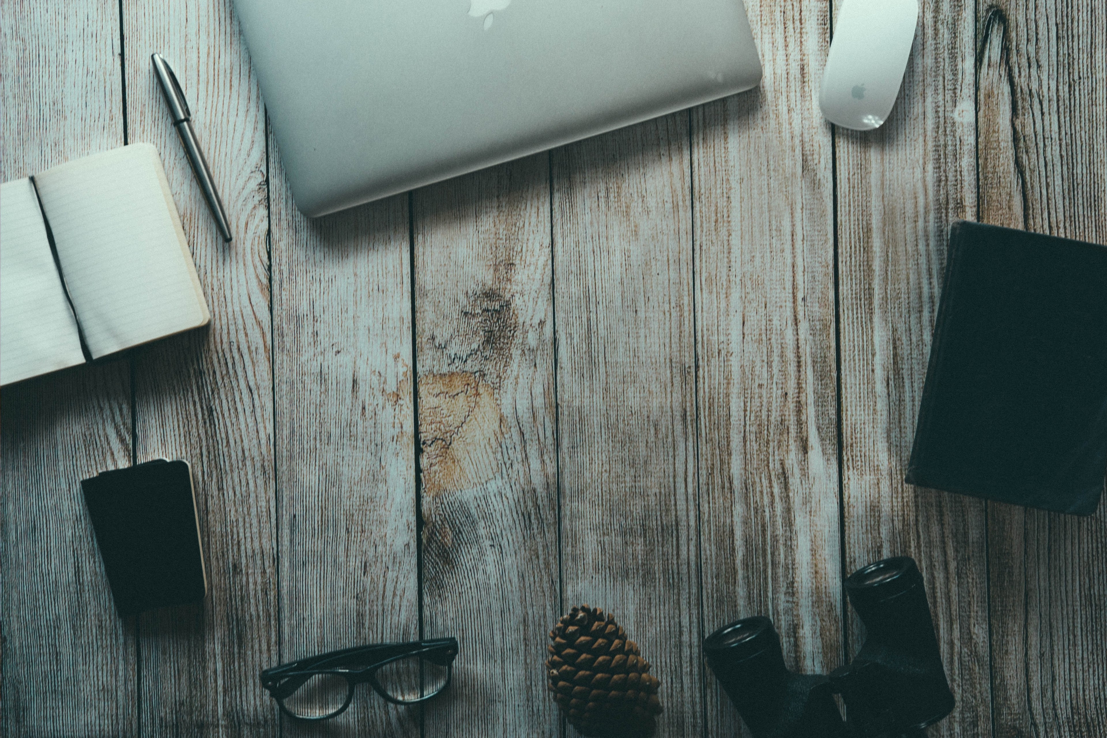 an unplugged typewriter on an office woodwork table holding a pinecone glass and a writers book, typewriter pinecone book and glass 4k, HD Wallpaper