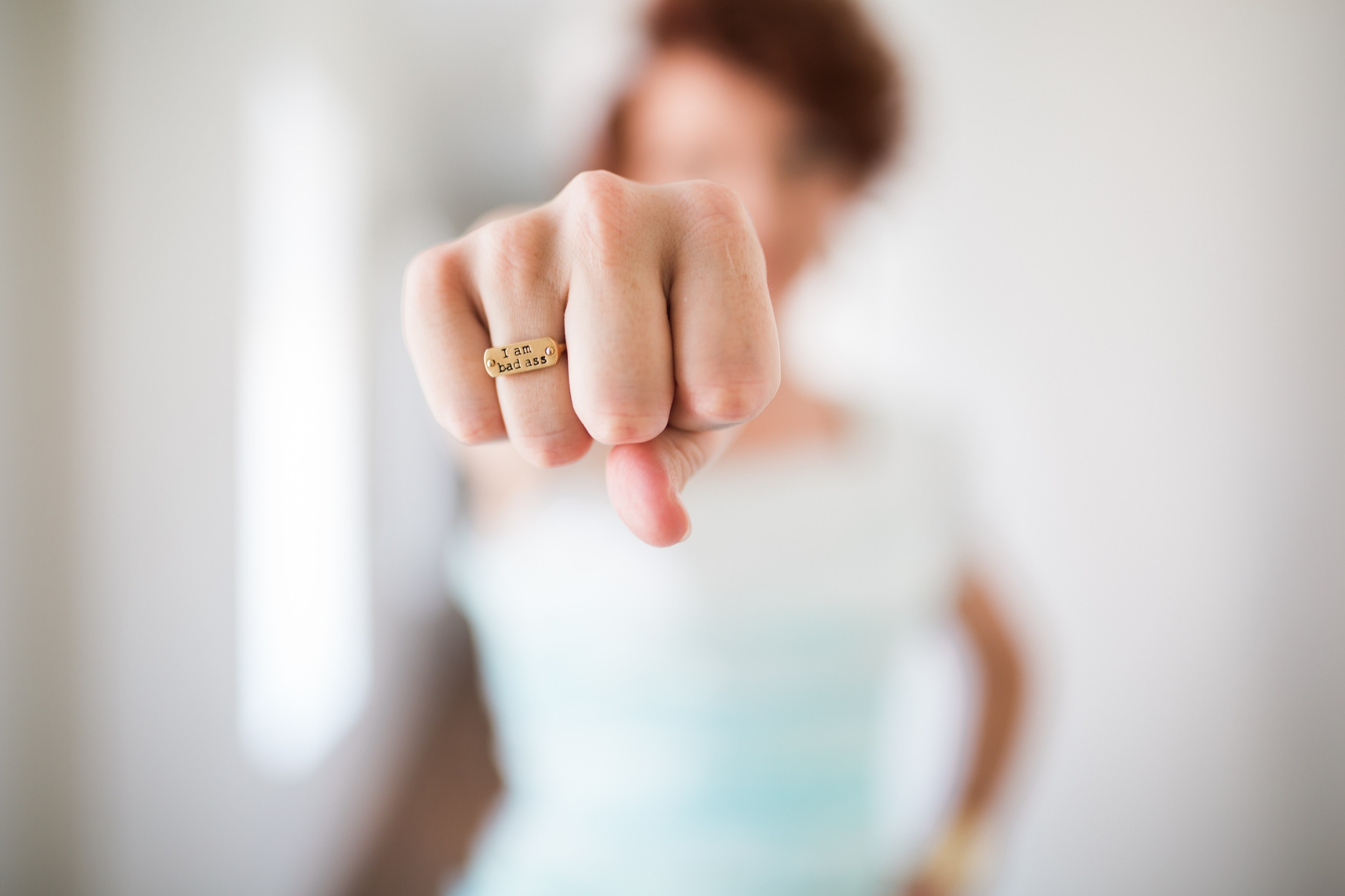 a persons clenched fist with an engraved ring with the phrase quoti am badassquot, i am badass 4k, HD Wallpaper