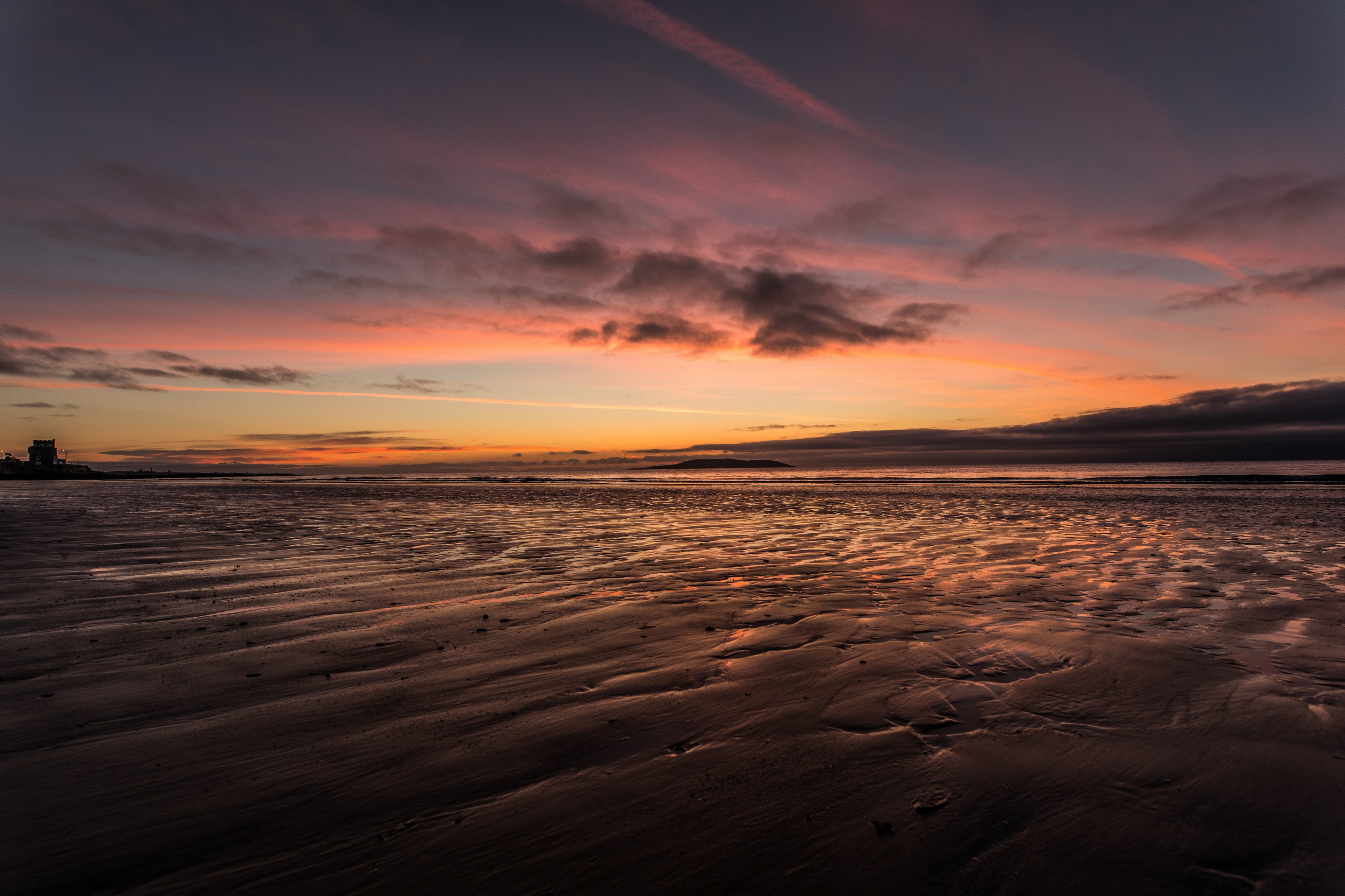 rippled sand with pools of water reflect the moody pink sunset at a beach during dusk, moody beach sunset_ 4k, HD Wallpaper