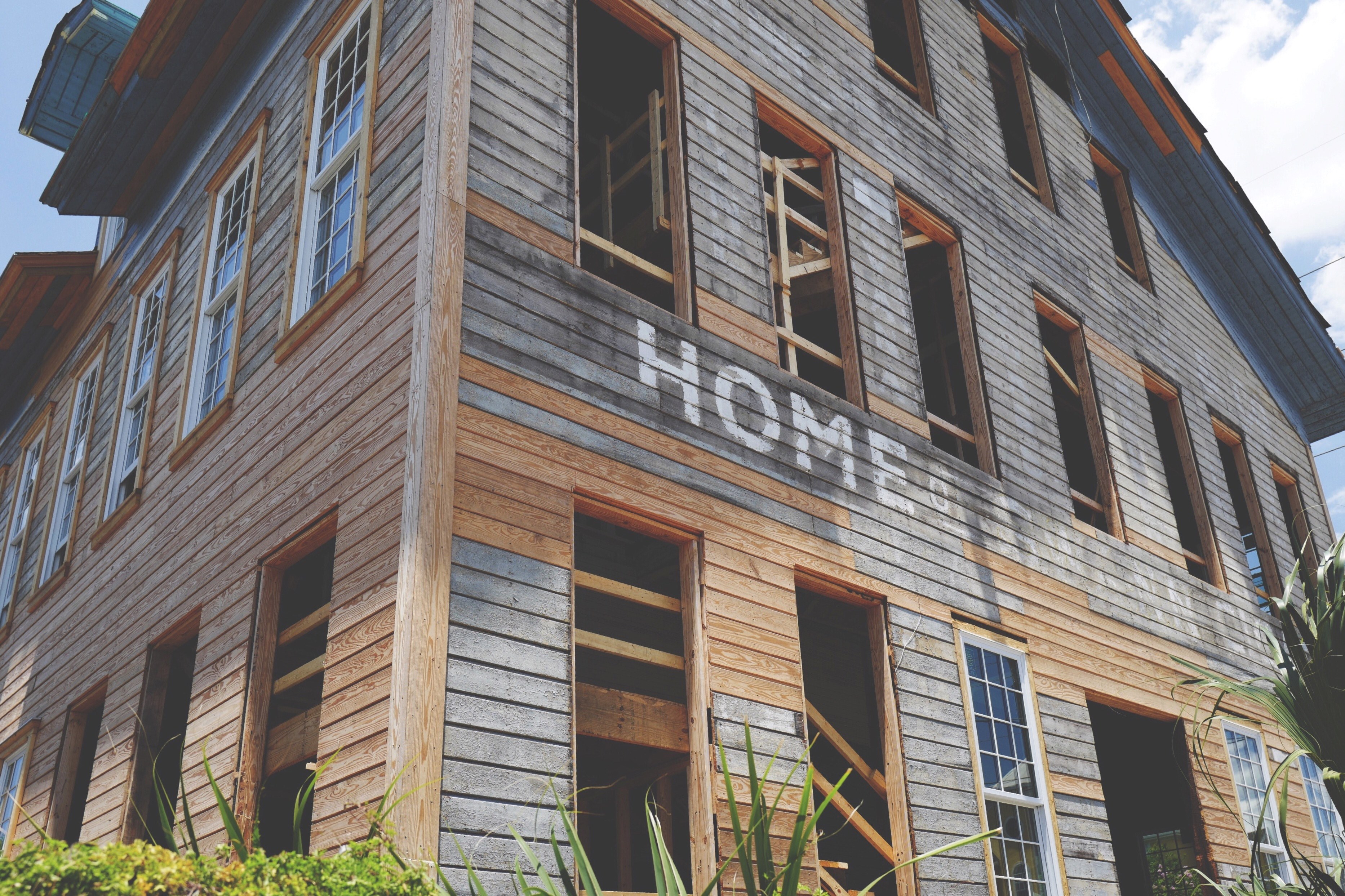 an old wooden building with a fading painted sign on it is being restored, fix er upper 4k, HD Wallpaper