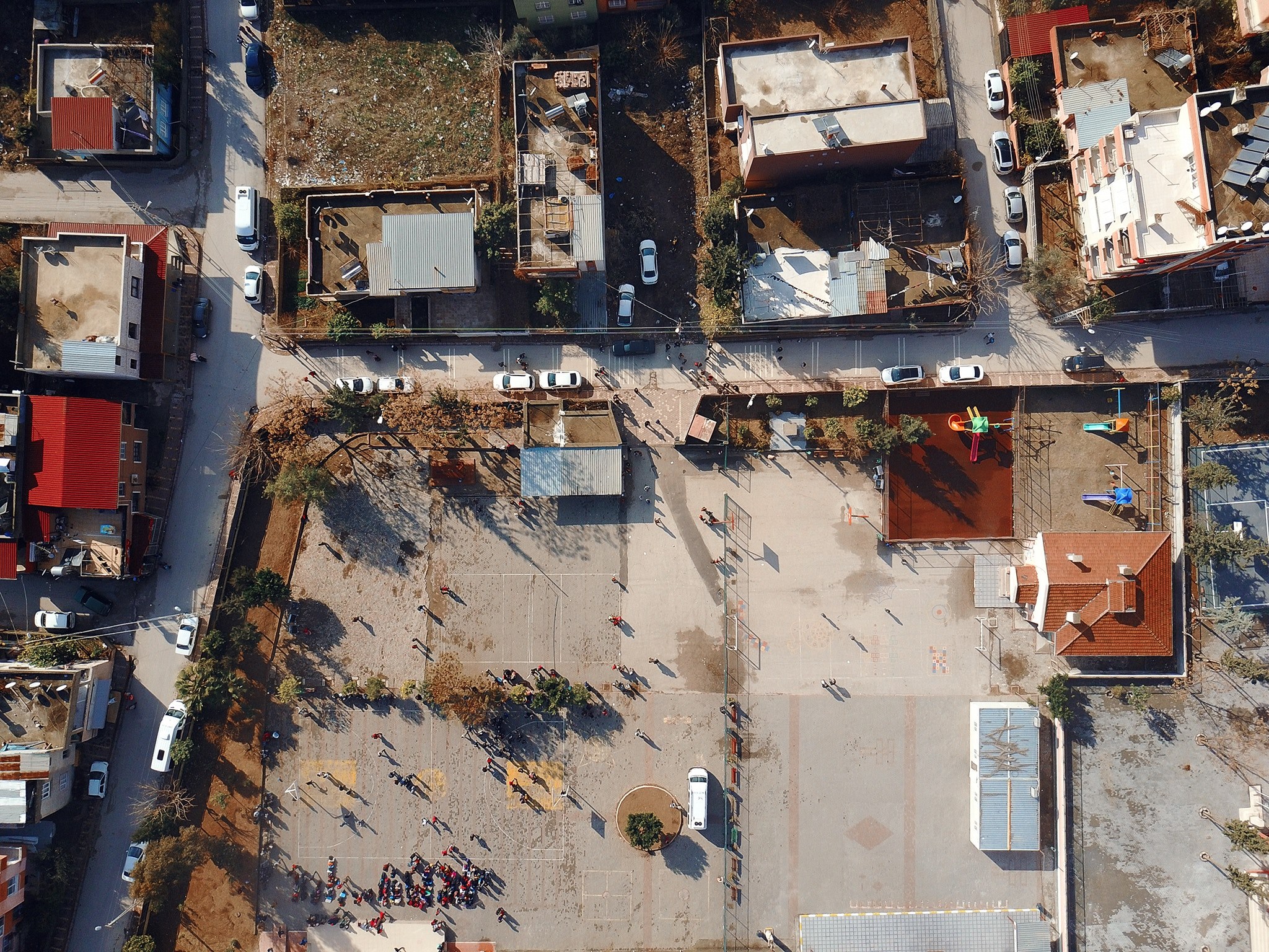 a drone shot of children in a playground in a suburban neighborhood, playground from above 4k, HD Wallpaper