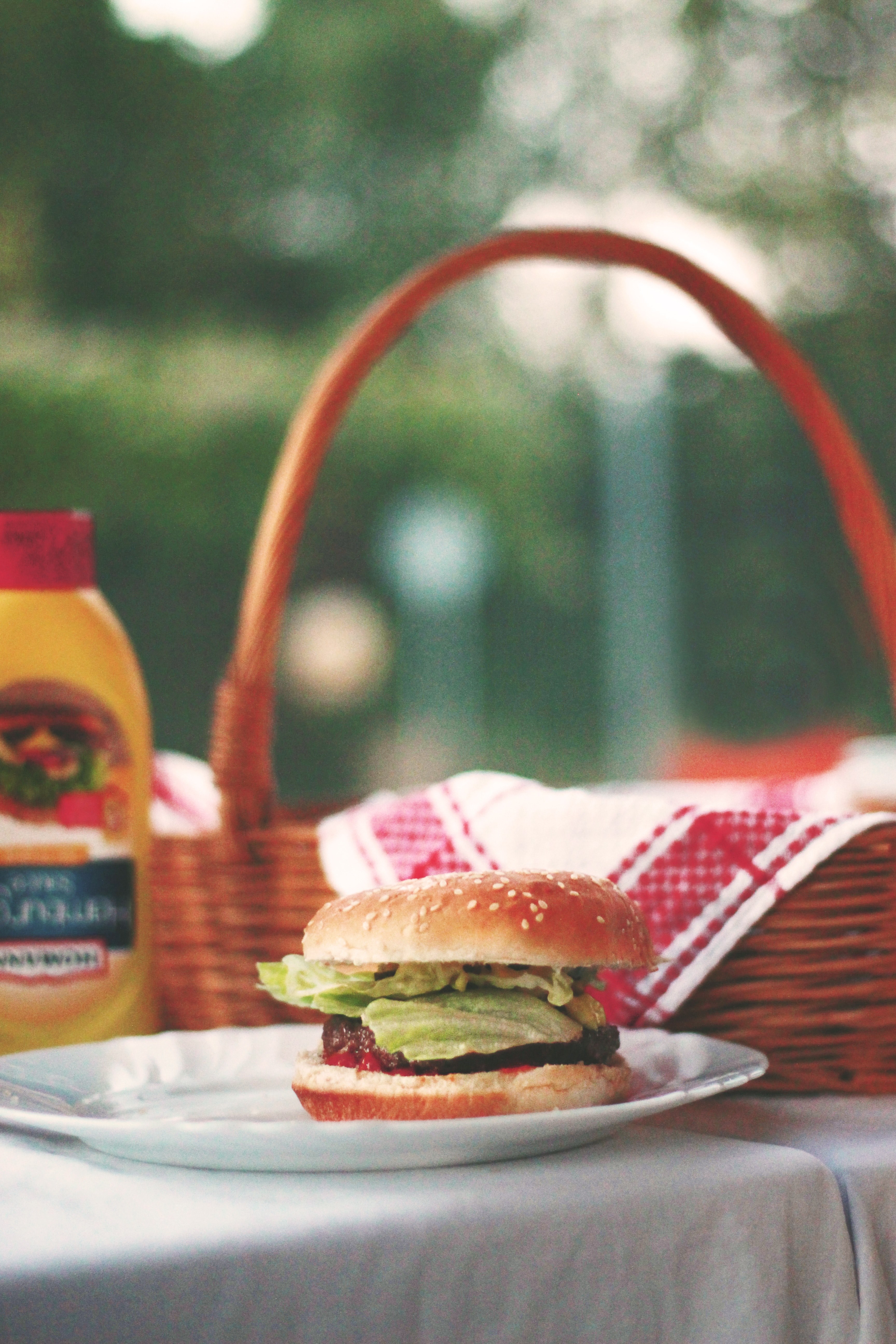 american hamburger on a picnic table by a basket, holiday cook out 4k, Phone HD Wallpaper