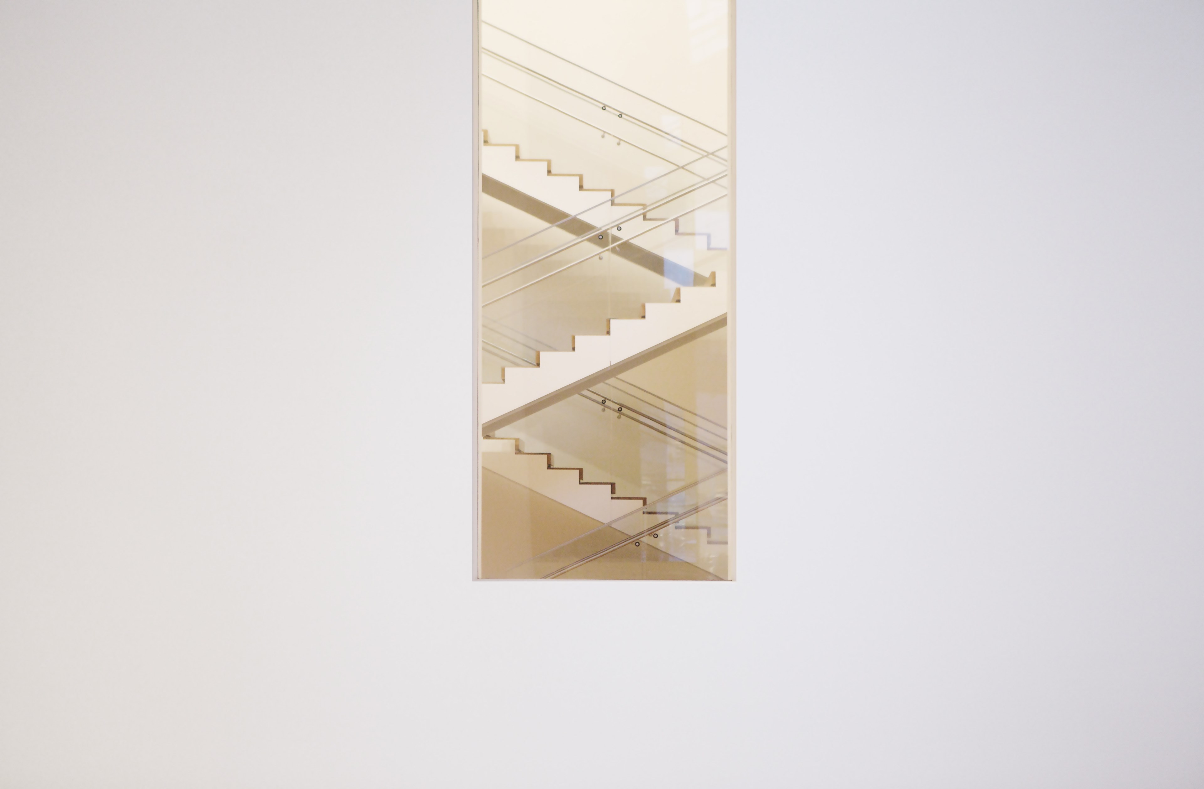 long shot of zig zag staircase through window in white wall the museum of modern art, white staircase 4k, HD Wallpaper