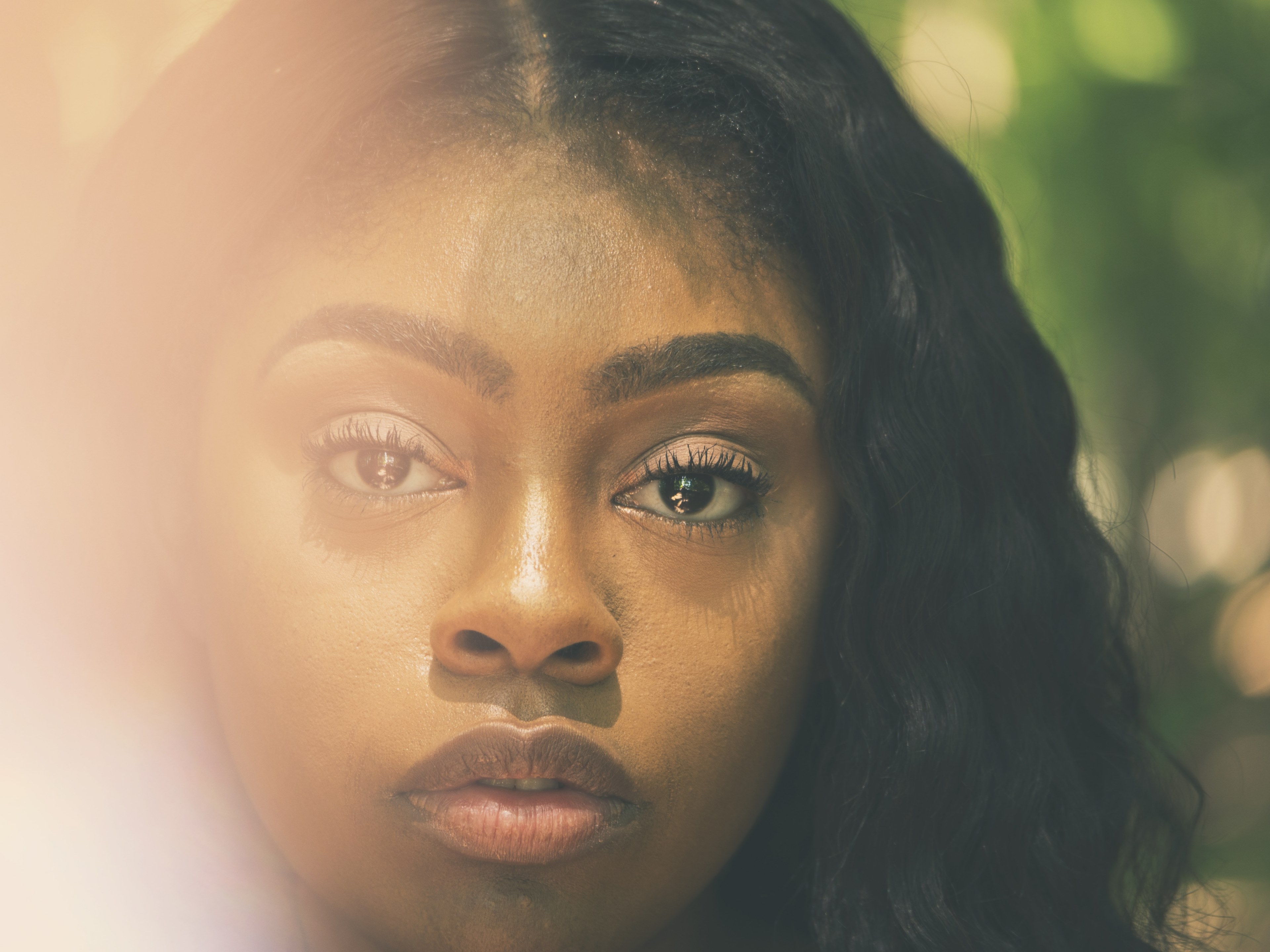 a portrait of a womans face with wavy black hair looking into the camera, into the deep 4k, HD Wallpaper