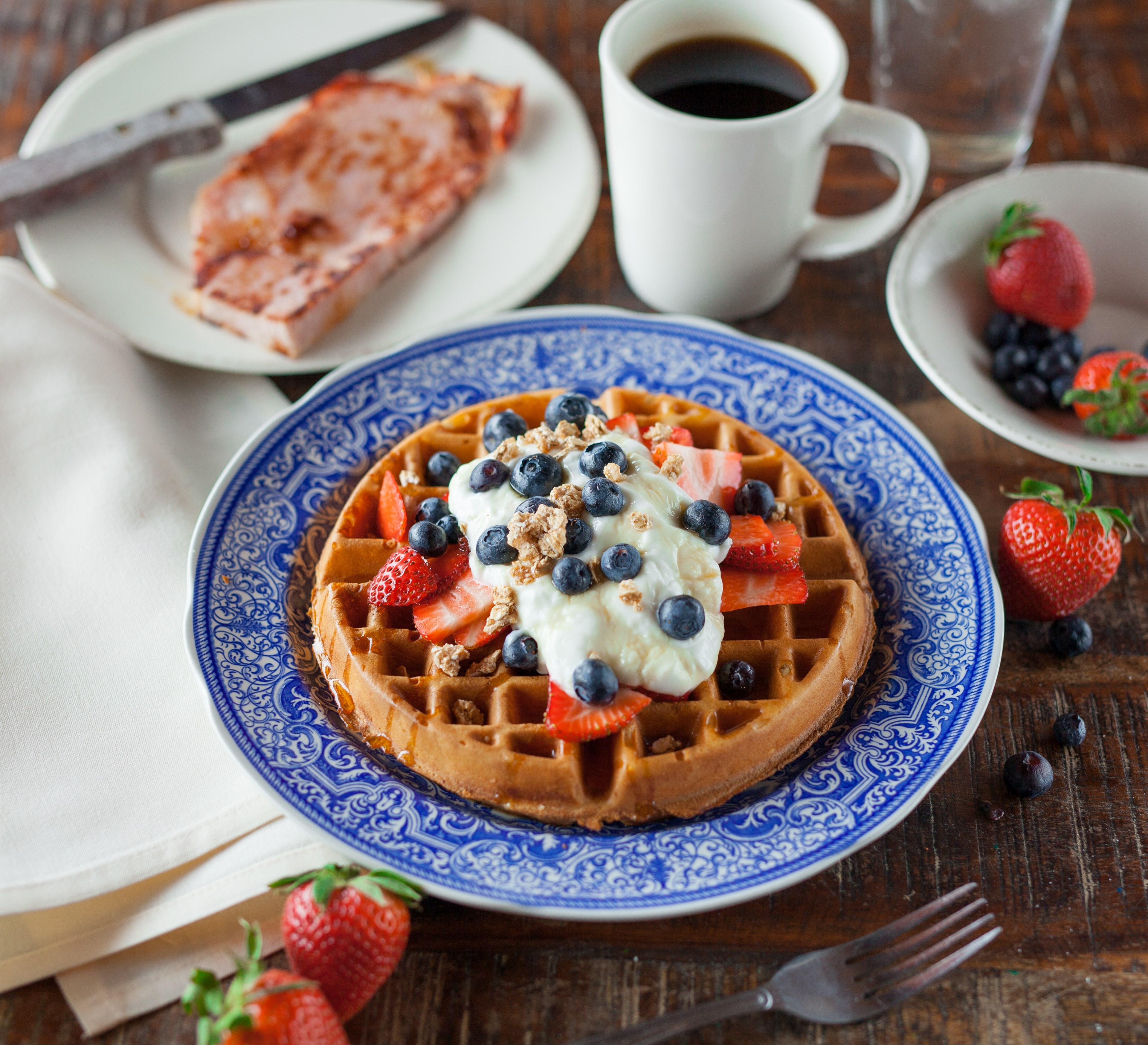 round waffles with whipped cream strawberries and blueberries next to a cup of coffee, fruit waffles and coffee 4k, HD Wallpaper