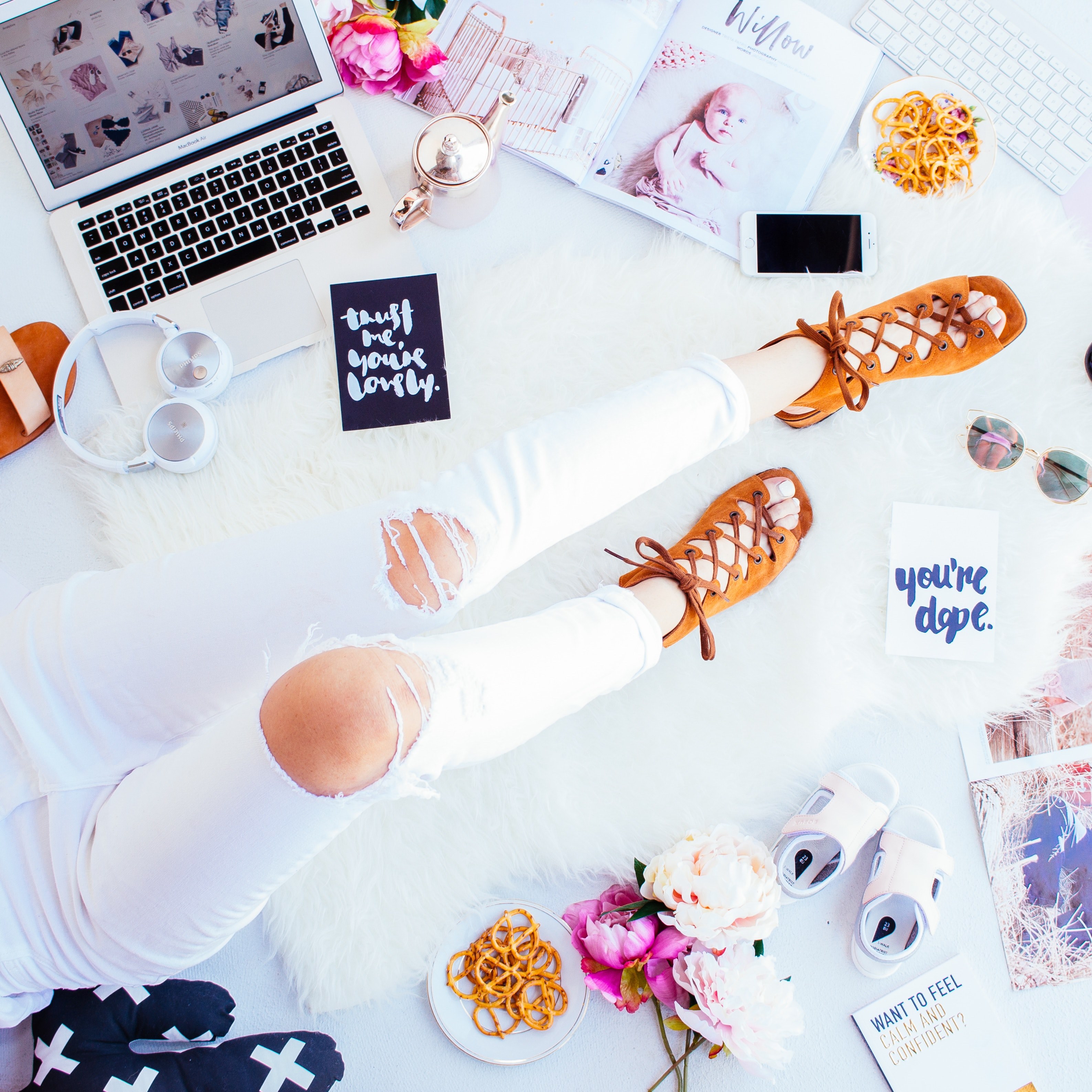 legs of a woman in ripped jeans lying on a messy floor near a laptop, working from home 4k, HD Wallpaper