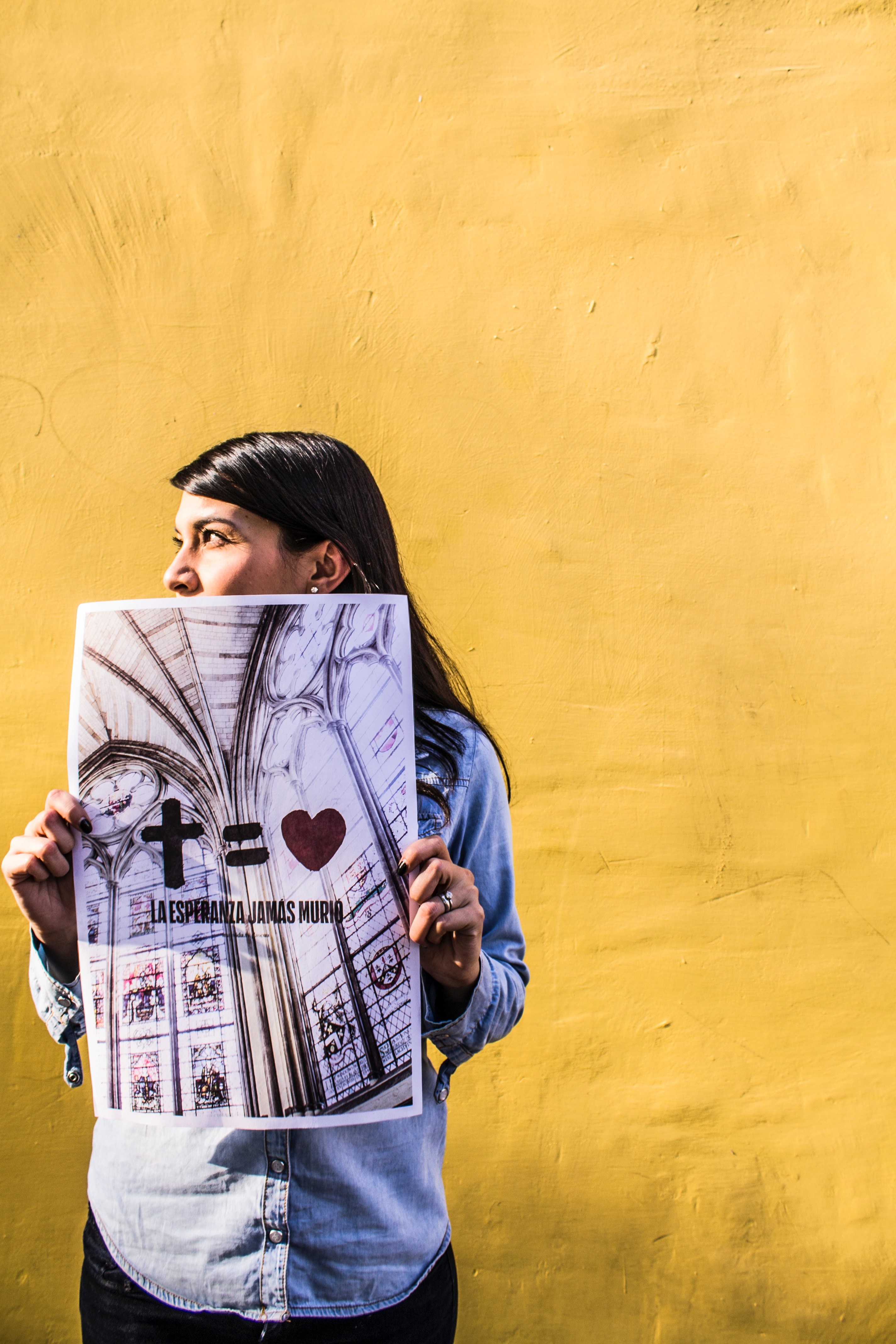 an indian person holding up a poster that says a cross equals love, _love 4k, Phone HD Wallpaper