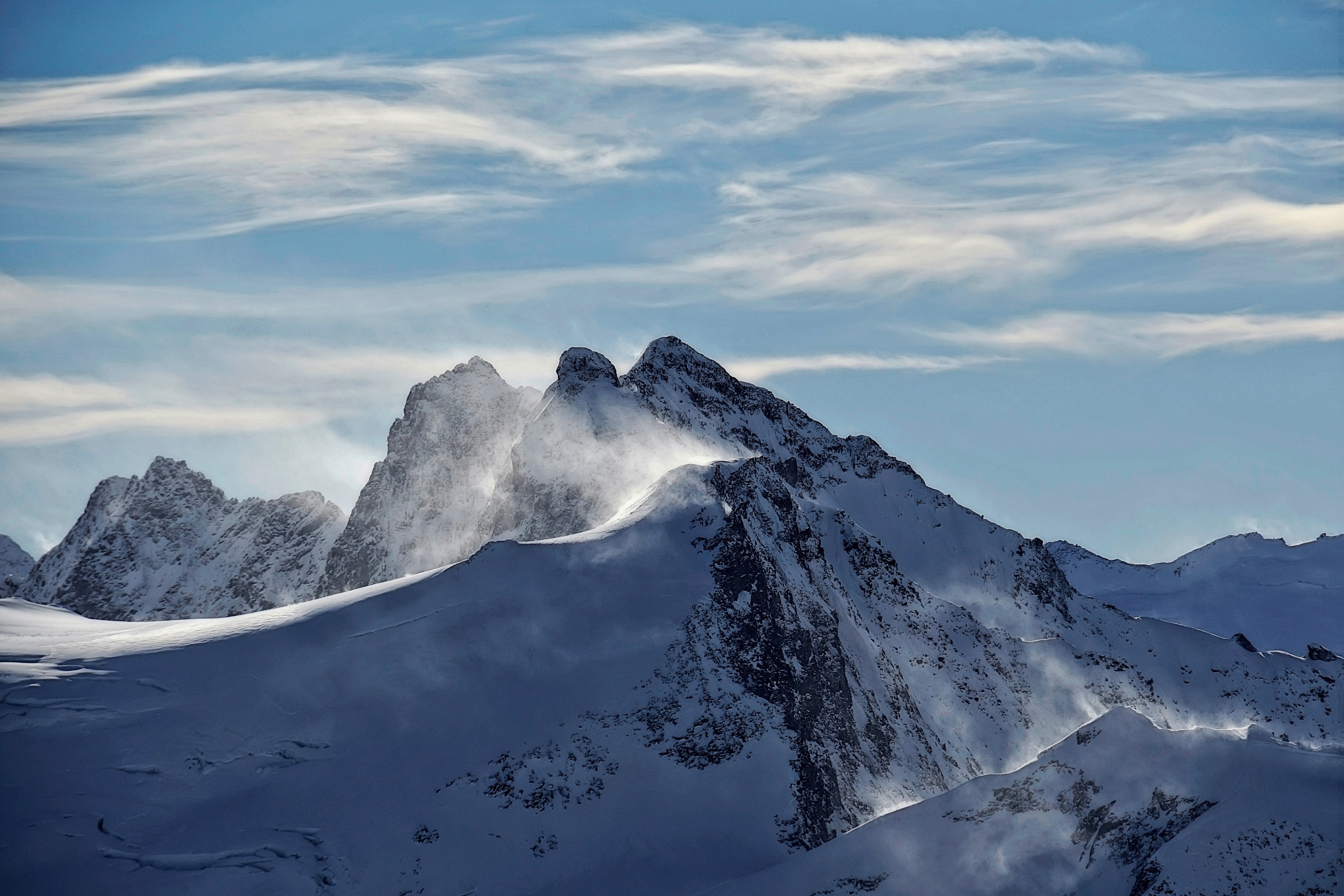 a snowy landscape with several tall peaks in titlis, windy mountains 4k, HD Wallpaper