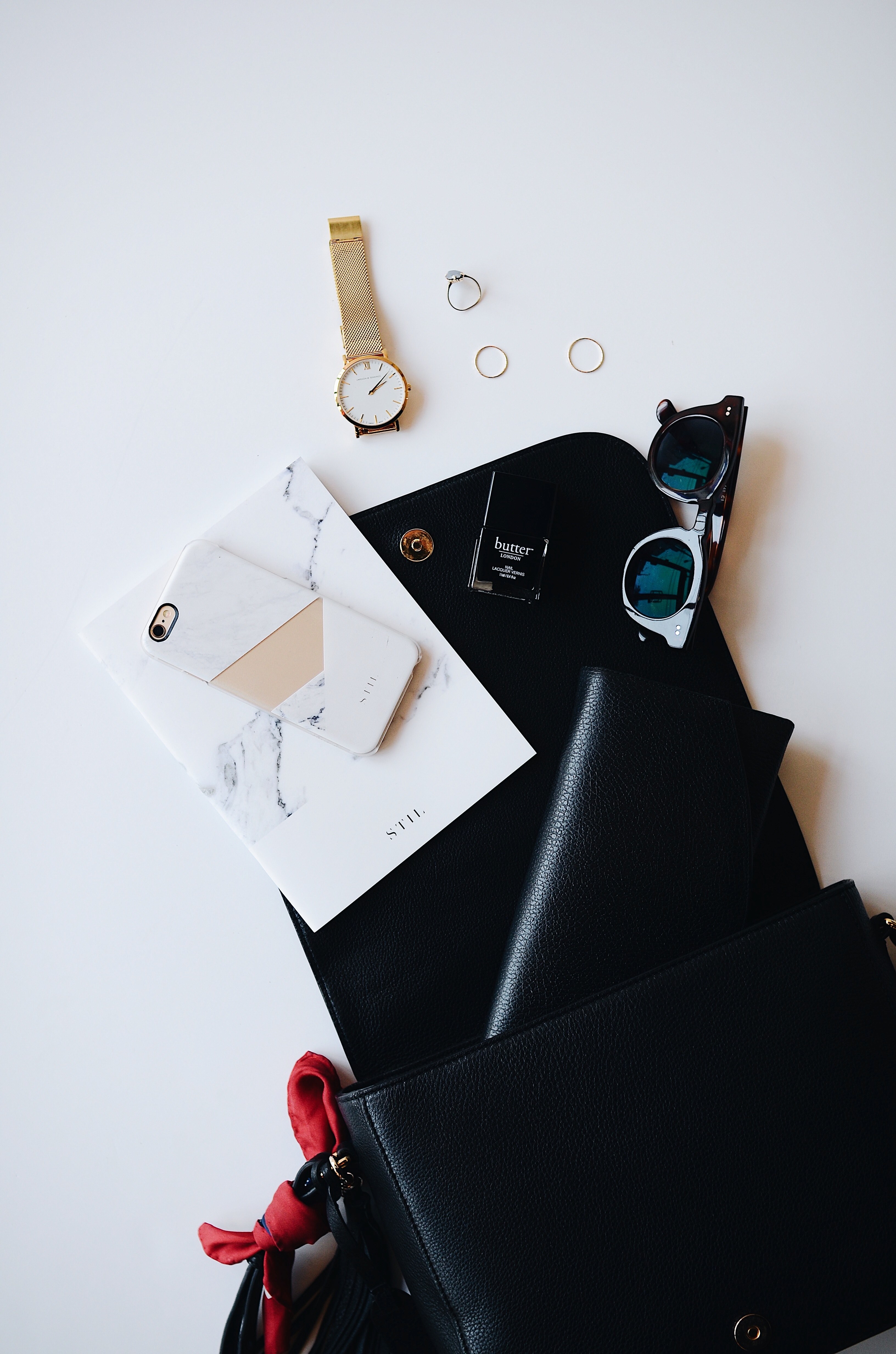 a black clipboard covered with random items such as a gold watch white smartphone leather wallet and pair of glasses, _black clipboard 4k, Phone HD Wallpaper
