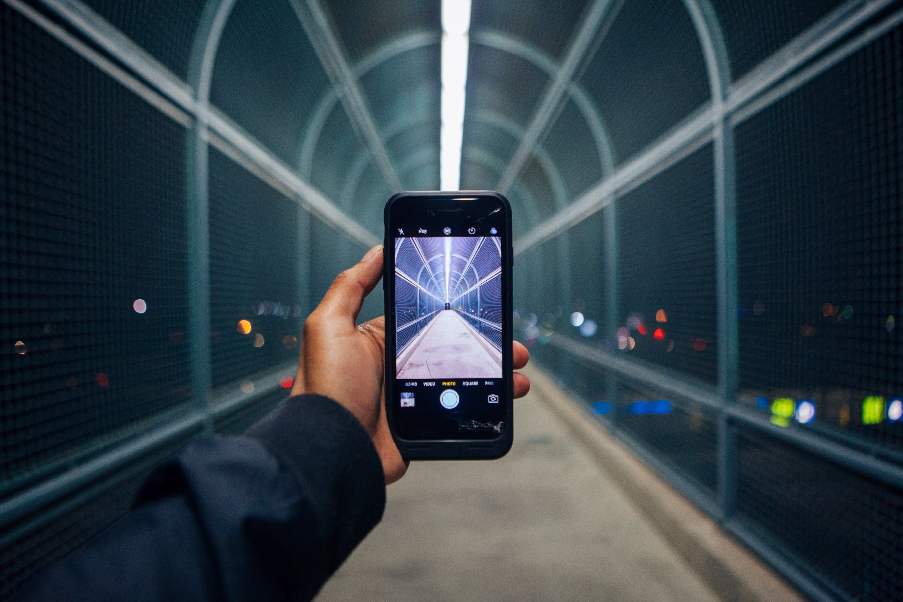 hand in blue sleeve holding smartphone taking a photograph of a bridge at night, taking night photo on phone 4k, HD Wallpaper