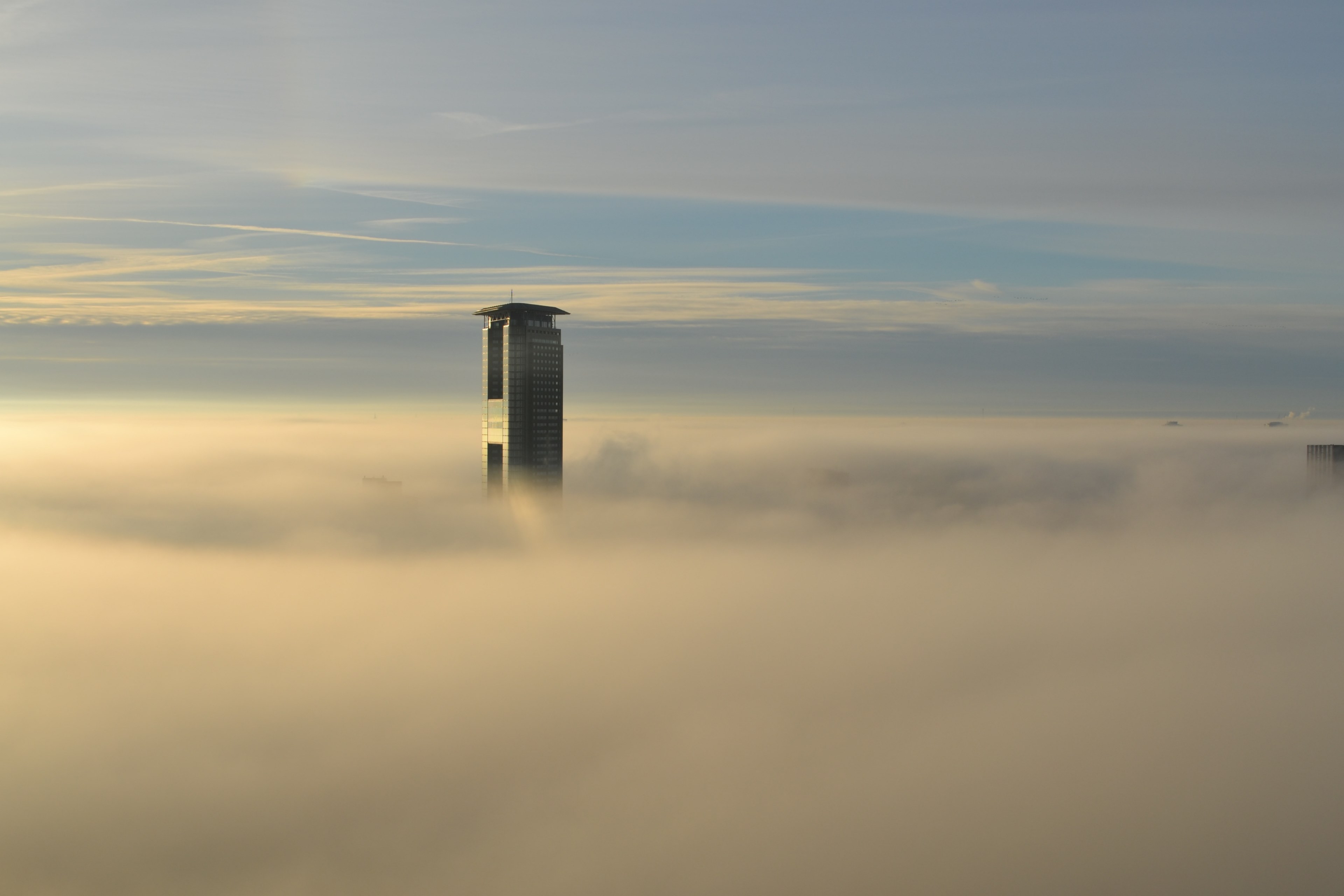 city skyscraper peeks through the clouds on a sunny day, buildings in the sky 4k, HD Wallpaper