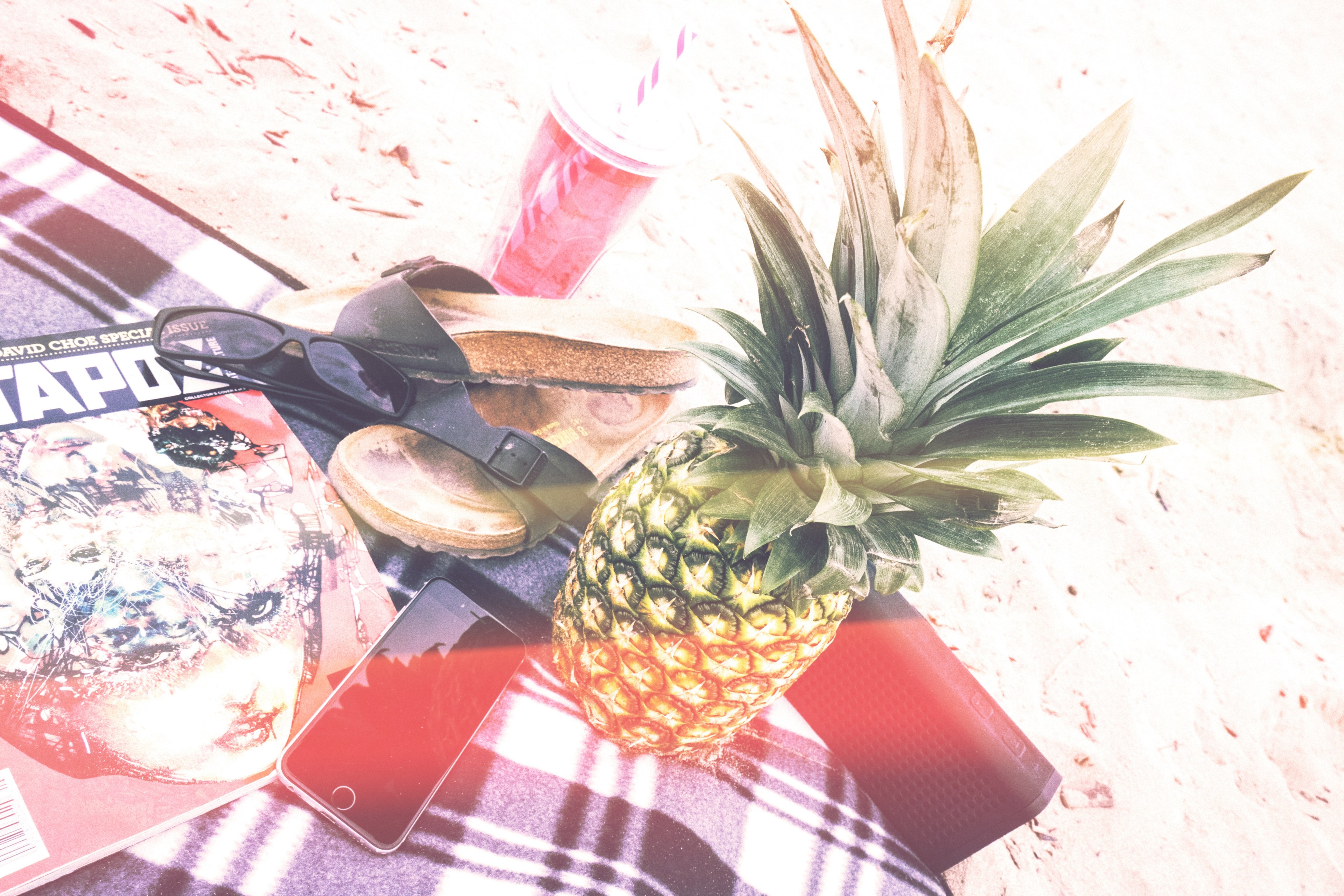 relaxing at port stanley with iphone pineapple sandal sunglass and a comic magazine, fruit magazine and iphone at port stanley 4k, HD Wallpaper