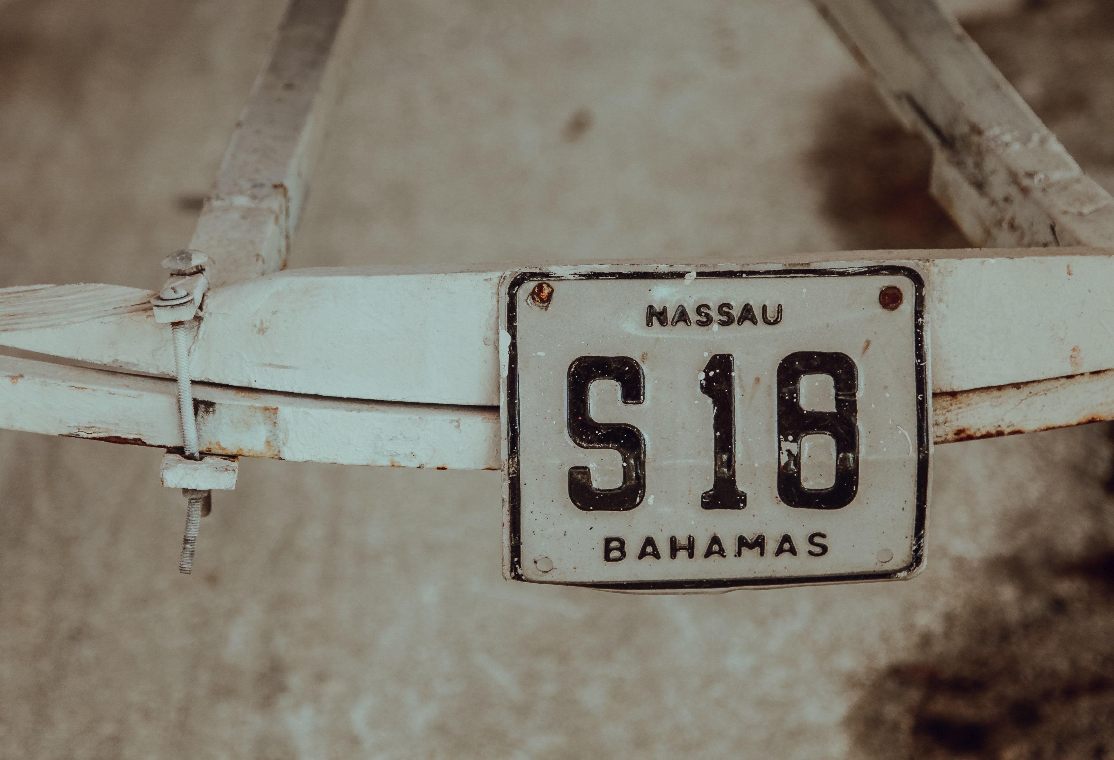 a vintage license plate of an old white bahama bike in nassau, _a plate of identity 4k, HD Wallpaper