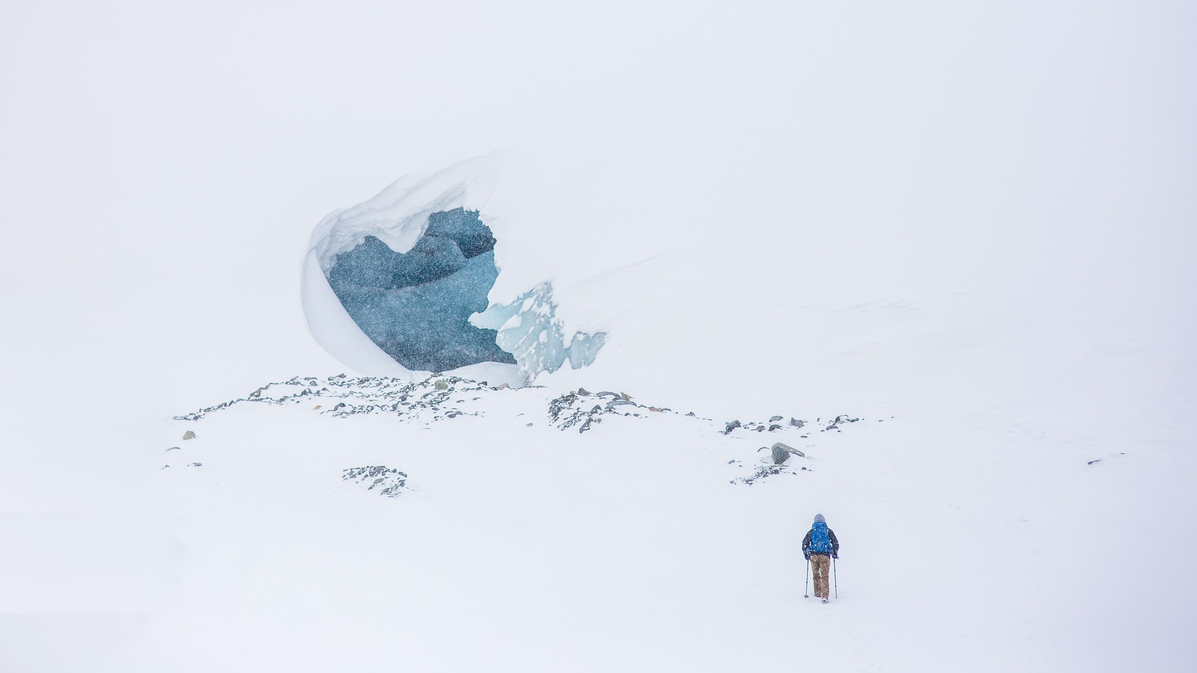 a landscape of a hiker walking in the snow to a ice cave, hiker heading to ice cave 4k, HD Wallpaper