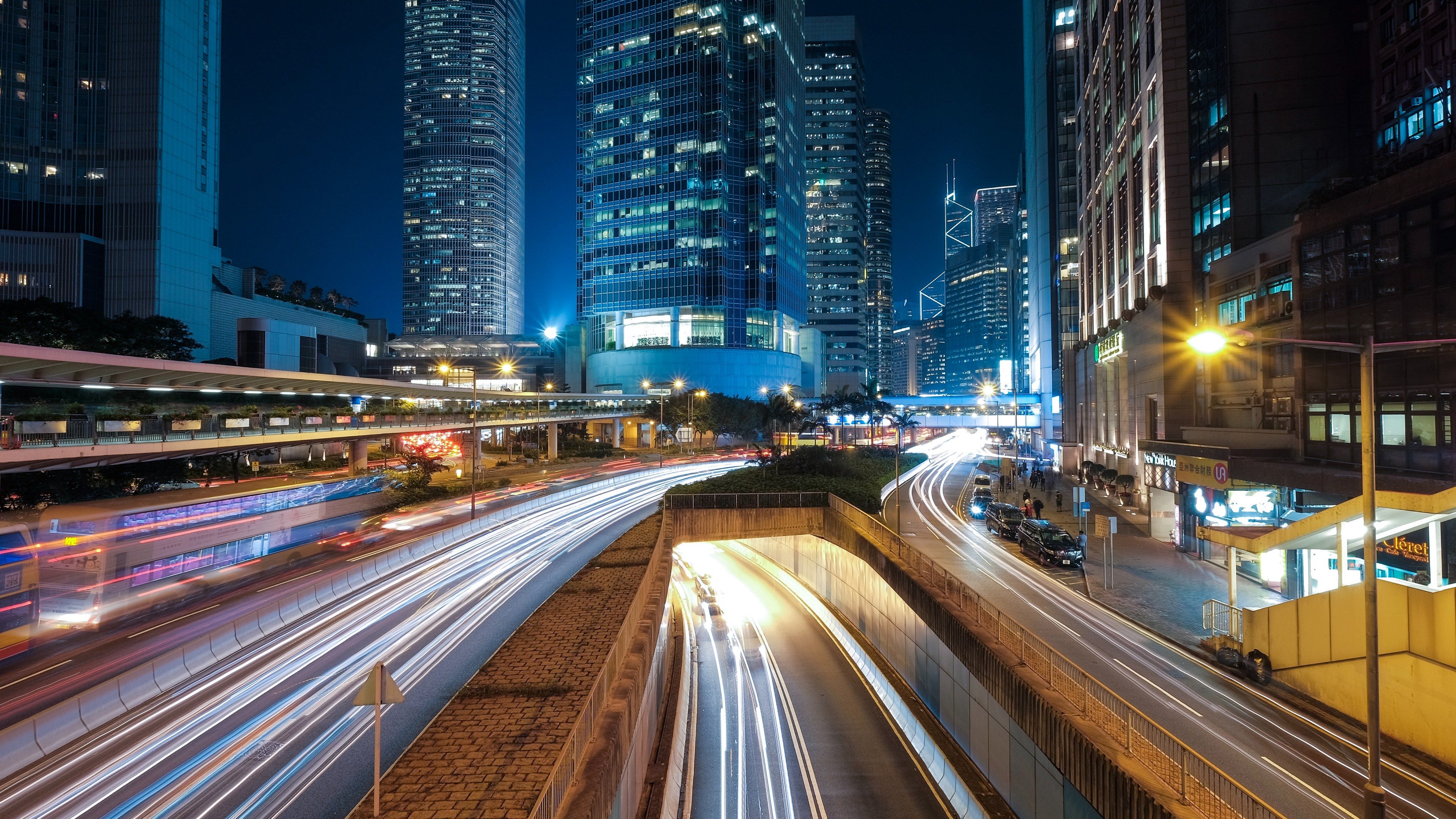 a bright night time shot of traffic light trails and urban buildings near the ifc shopping mall, man cheung street at night 4k, HD Wallpaper