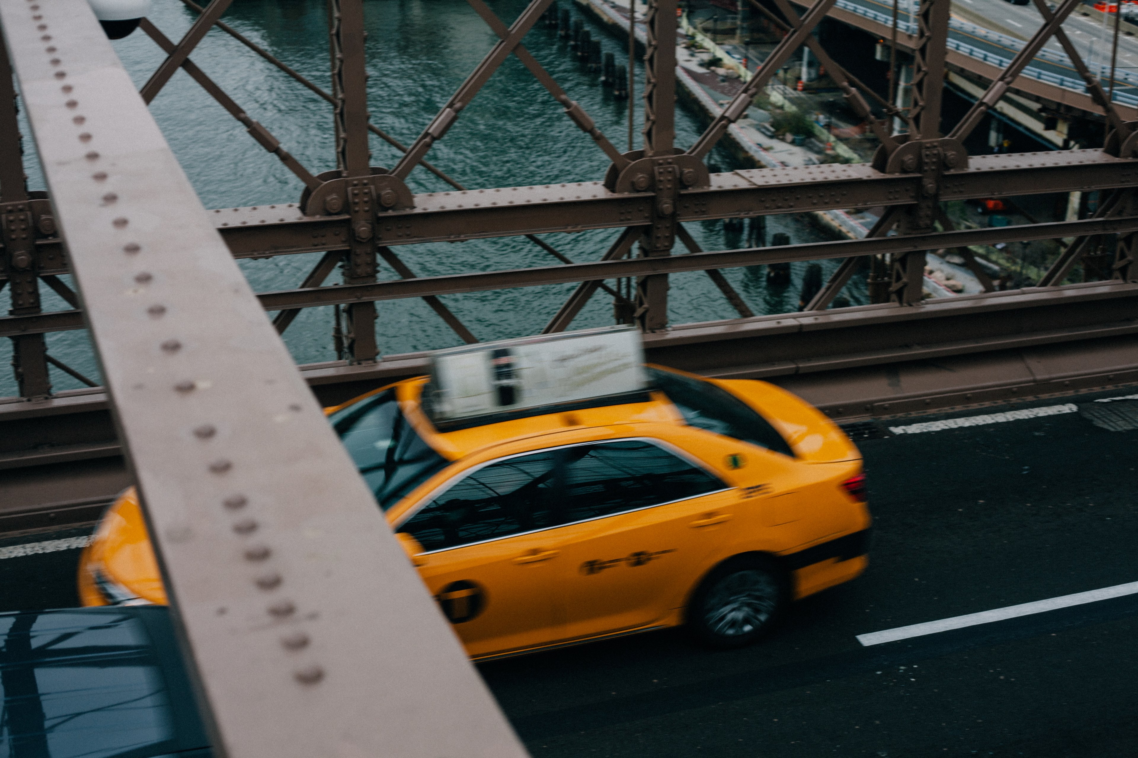 a high view of a yellow taxi cab driving on a bridge, yellow taxi cab from above 4k, HD Wallpaper