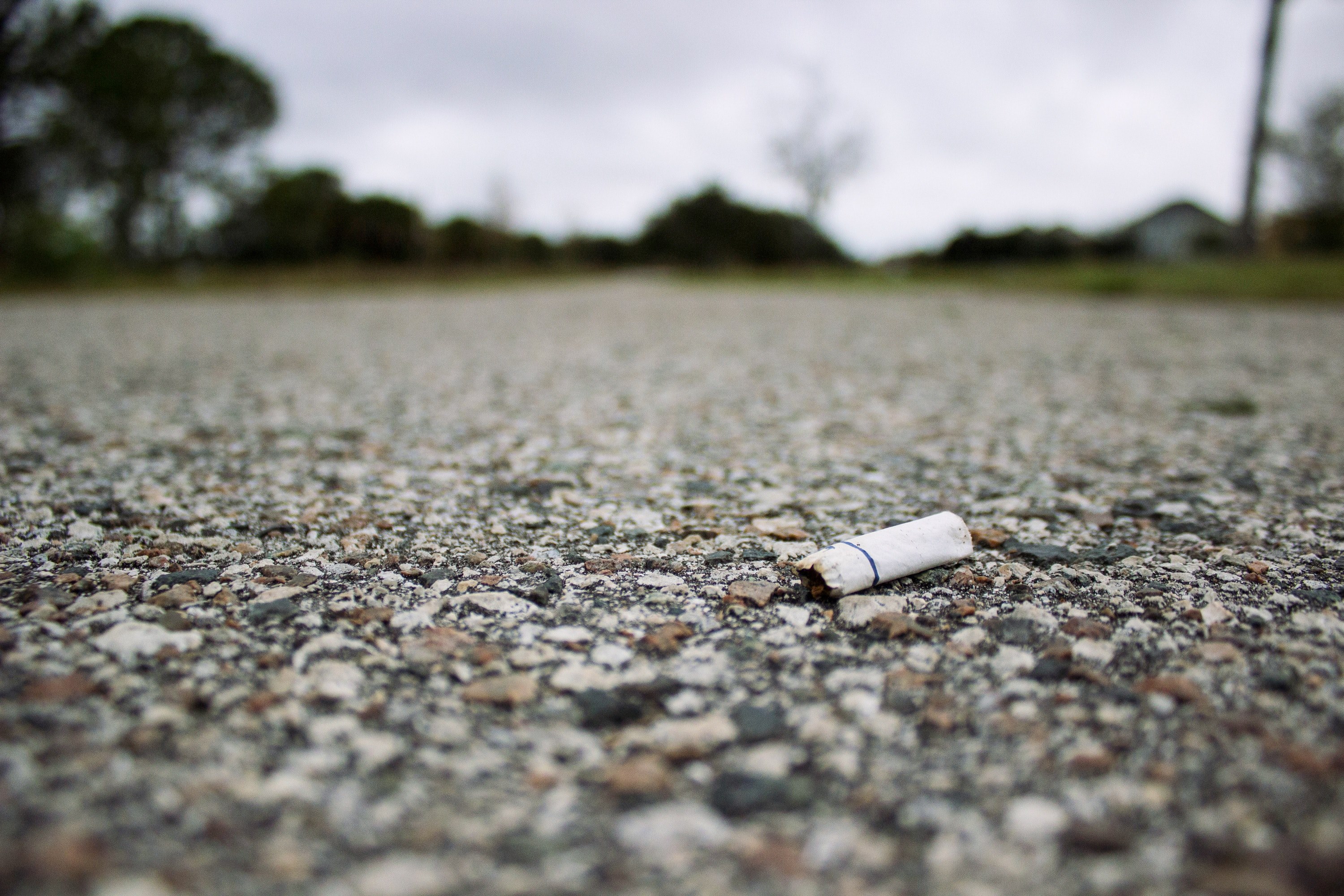 cigarette road cigarette butt and gravel 4k, HD Wallpaper