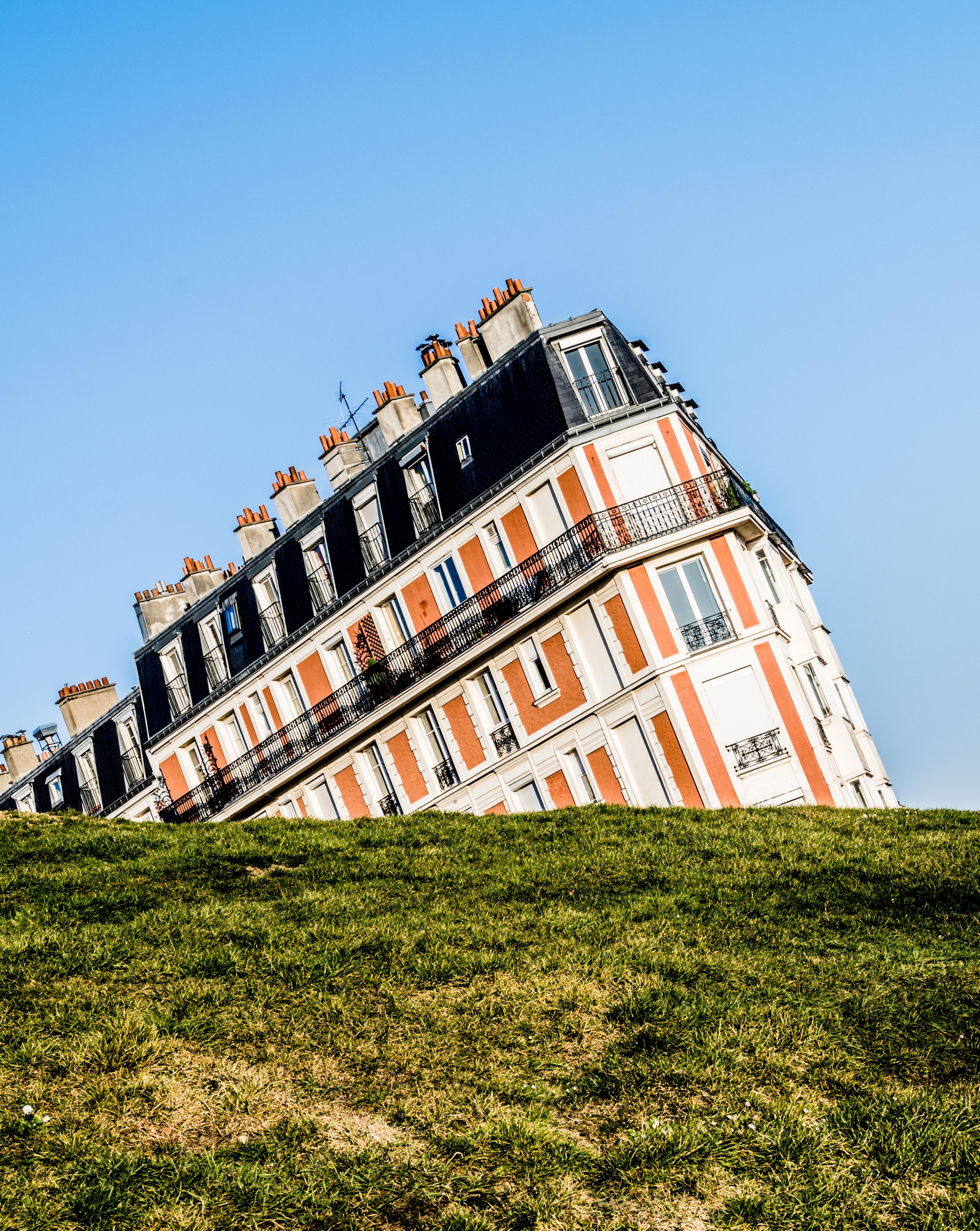 an angular shot of an apartment building with french architecture in paris, _swinging perspective 4k, Phone HD Wallpaper