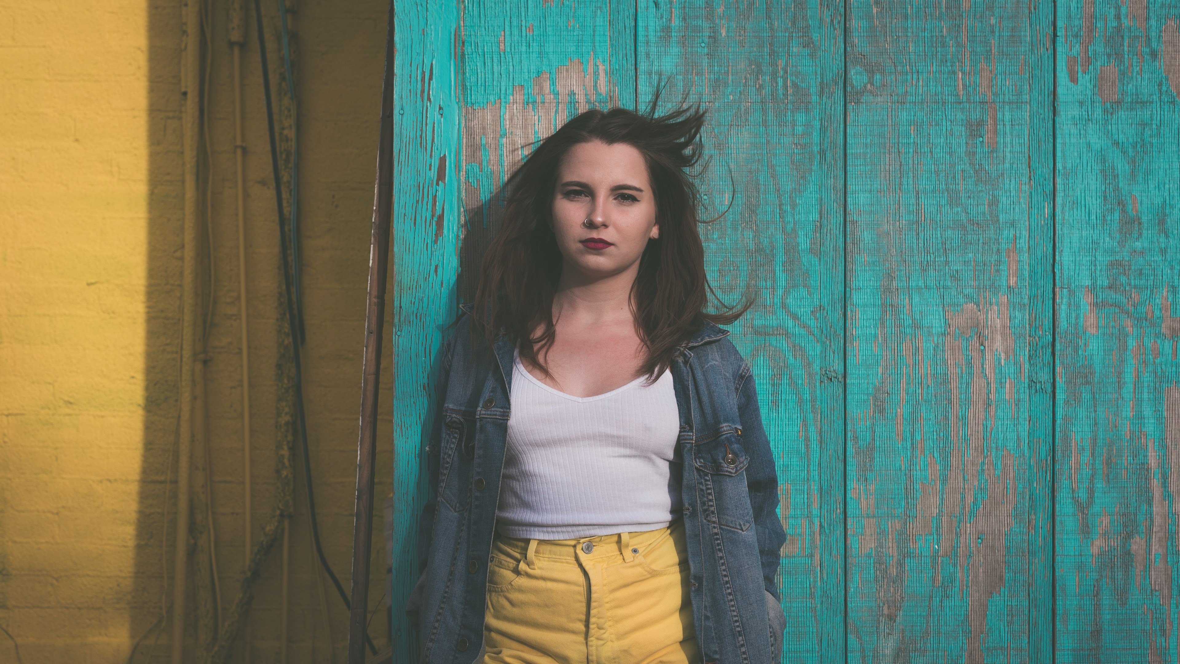 young woman in jeans jacket posing in front of colorful background at jacksonville beach, haley 4k, HD Wallpaper
