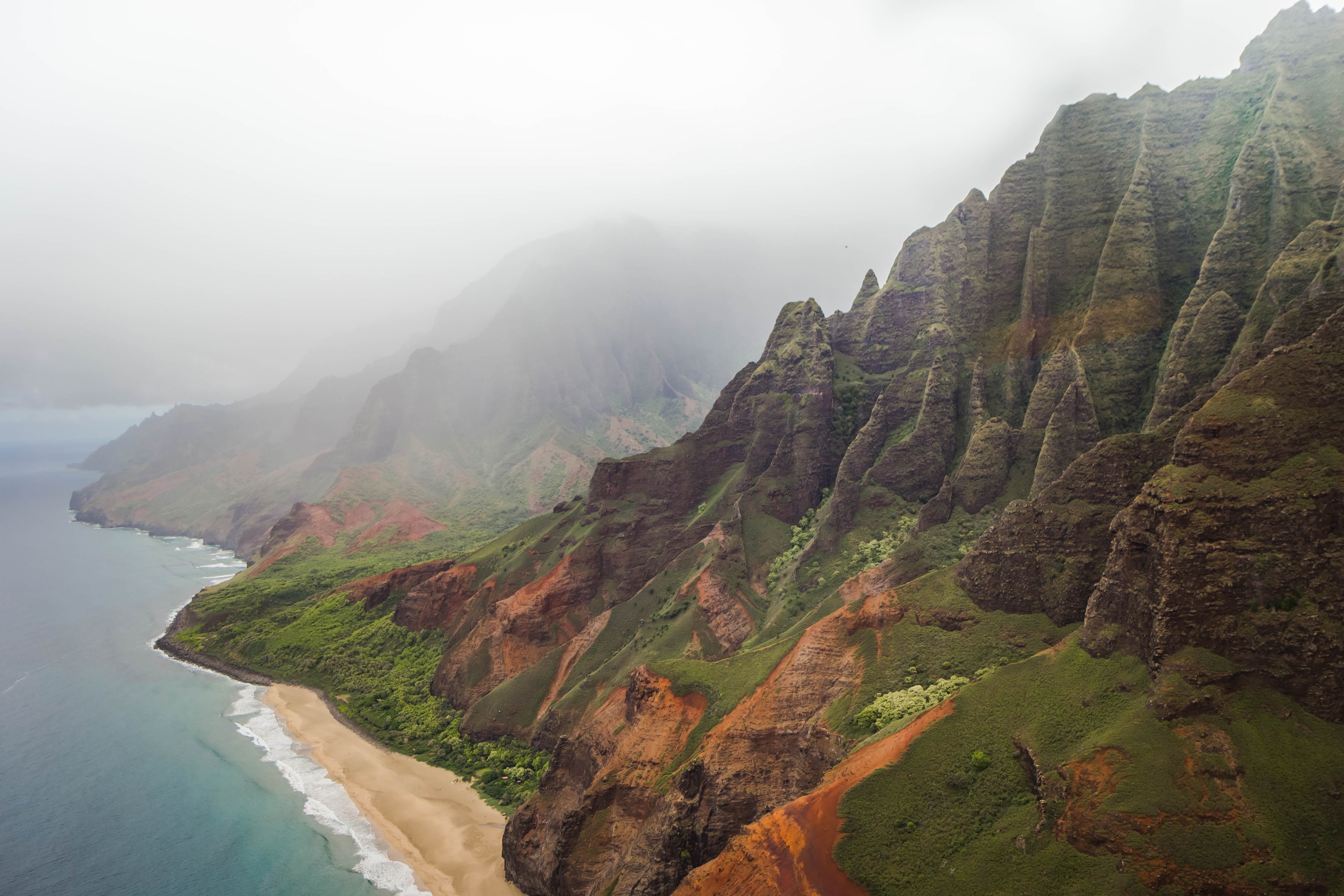 tall mountains running along a coast with a sandy beach, mountainous coastline 4k, HD Wallpaper