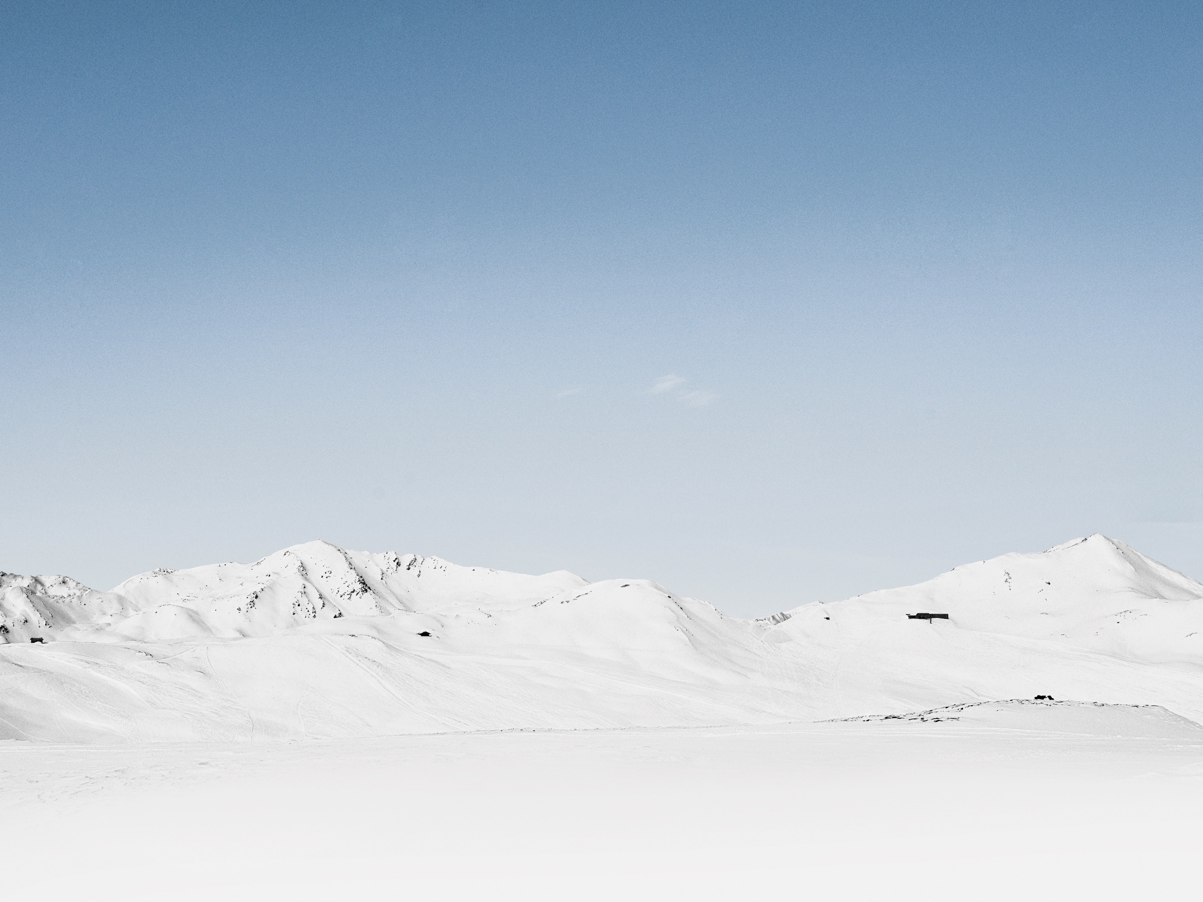 a mountain ridge under a snow blanket on a cloudless day, white mountains under pale blue sky 4k, HD Wallpaper
