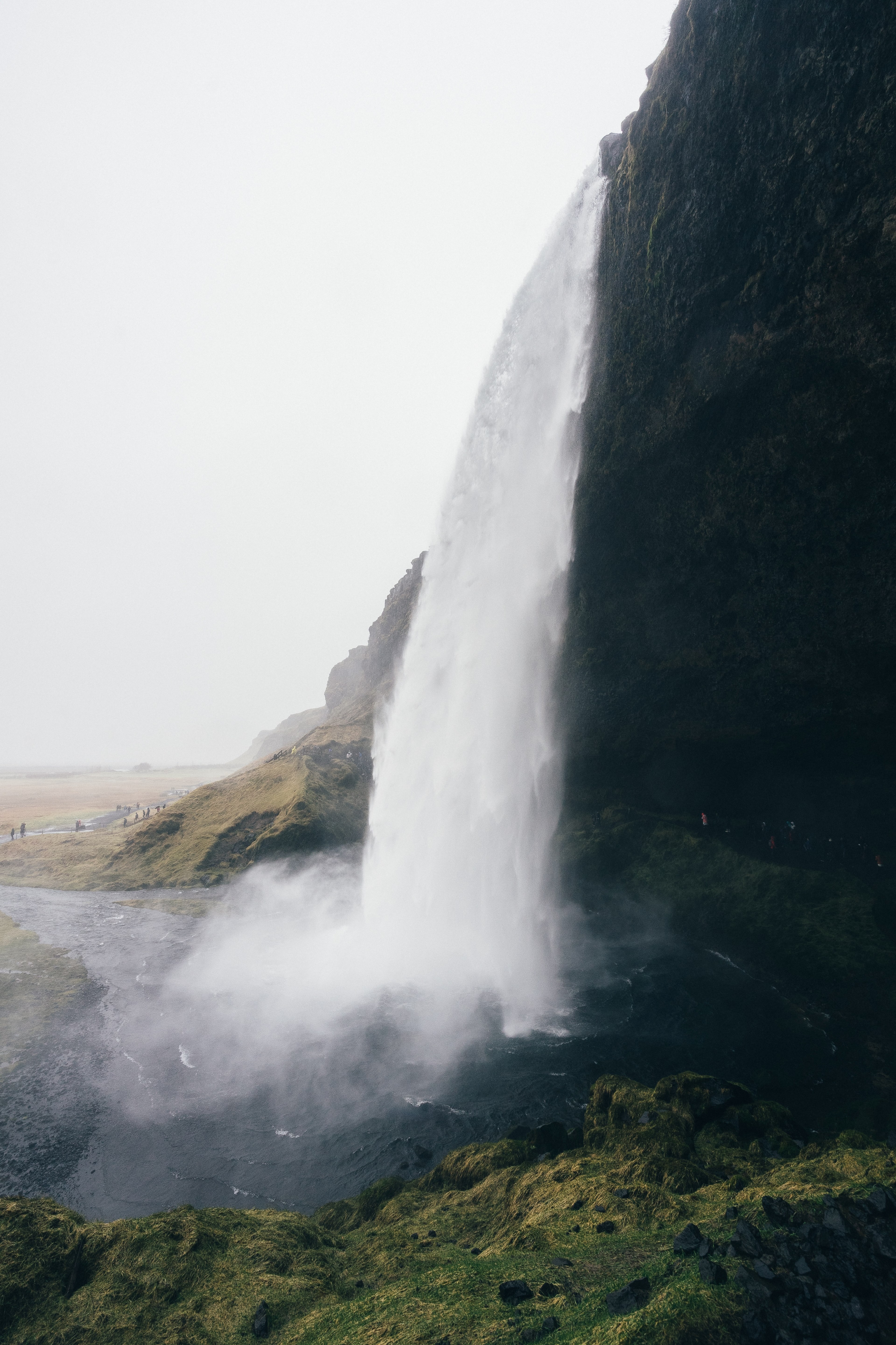 cascading seljalandsfoss waterfall drops off misty cliff, seljalandsfoss 4k, Phone HD Wallpaper