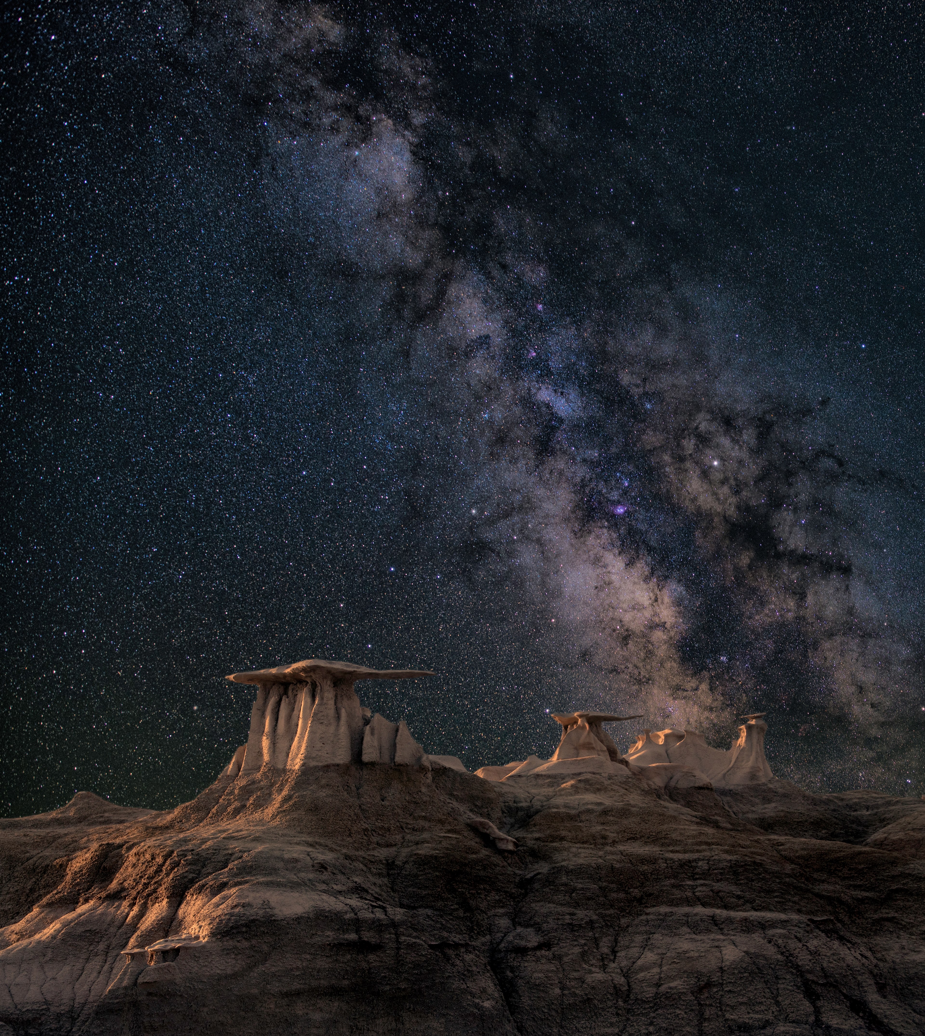 the milky way rises above the rock formations against the star studded night sky, _wayfinders 4k, Phone HD Wallpaper