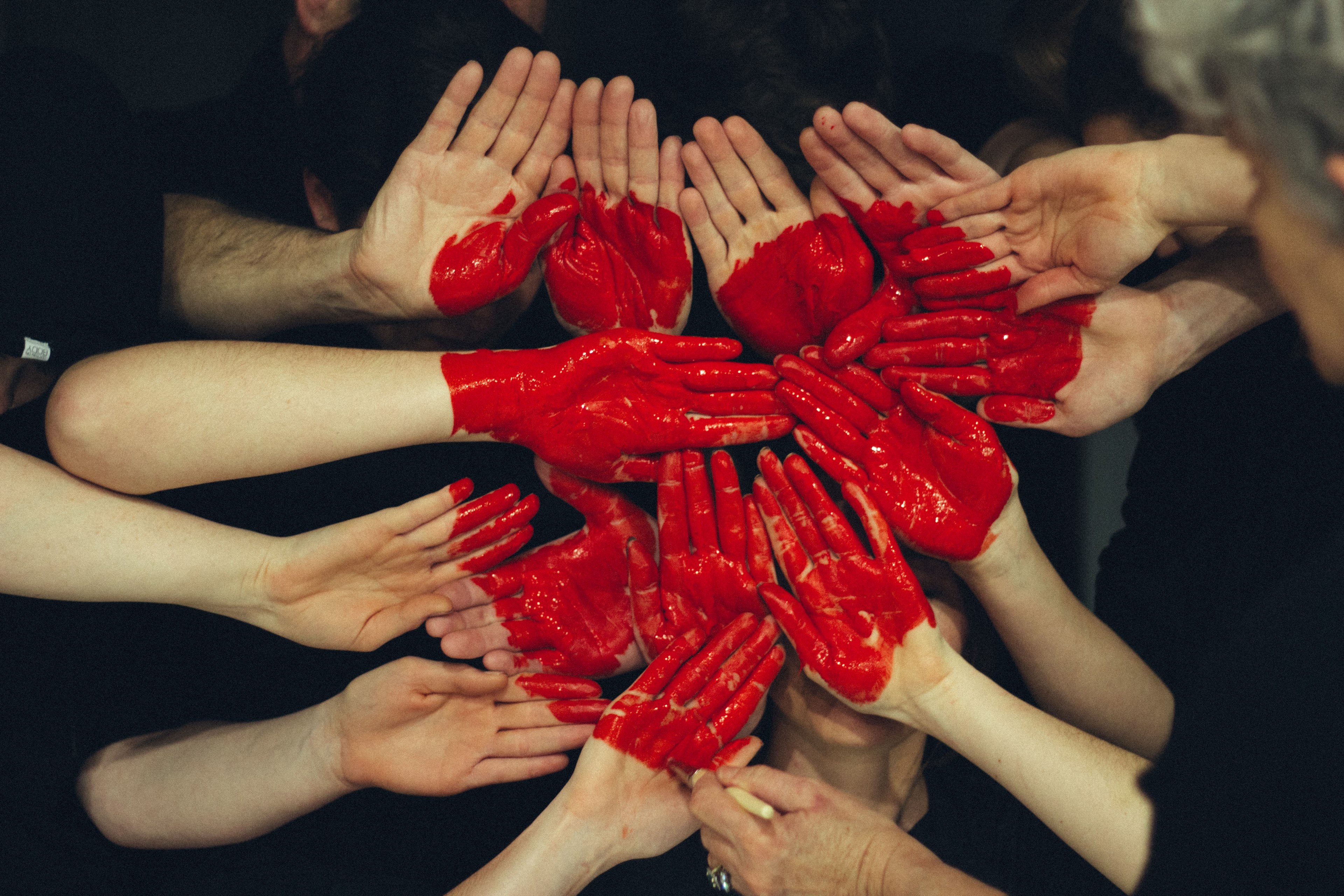 many peoples hands are painted red to form together a large red heart, painted red 4k, HD Wallpaper
