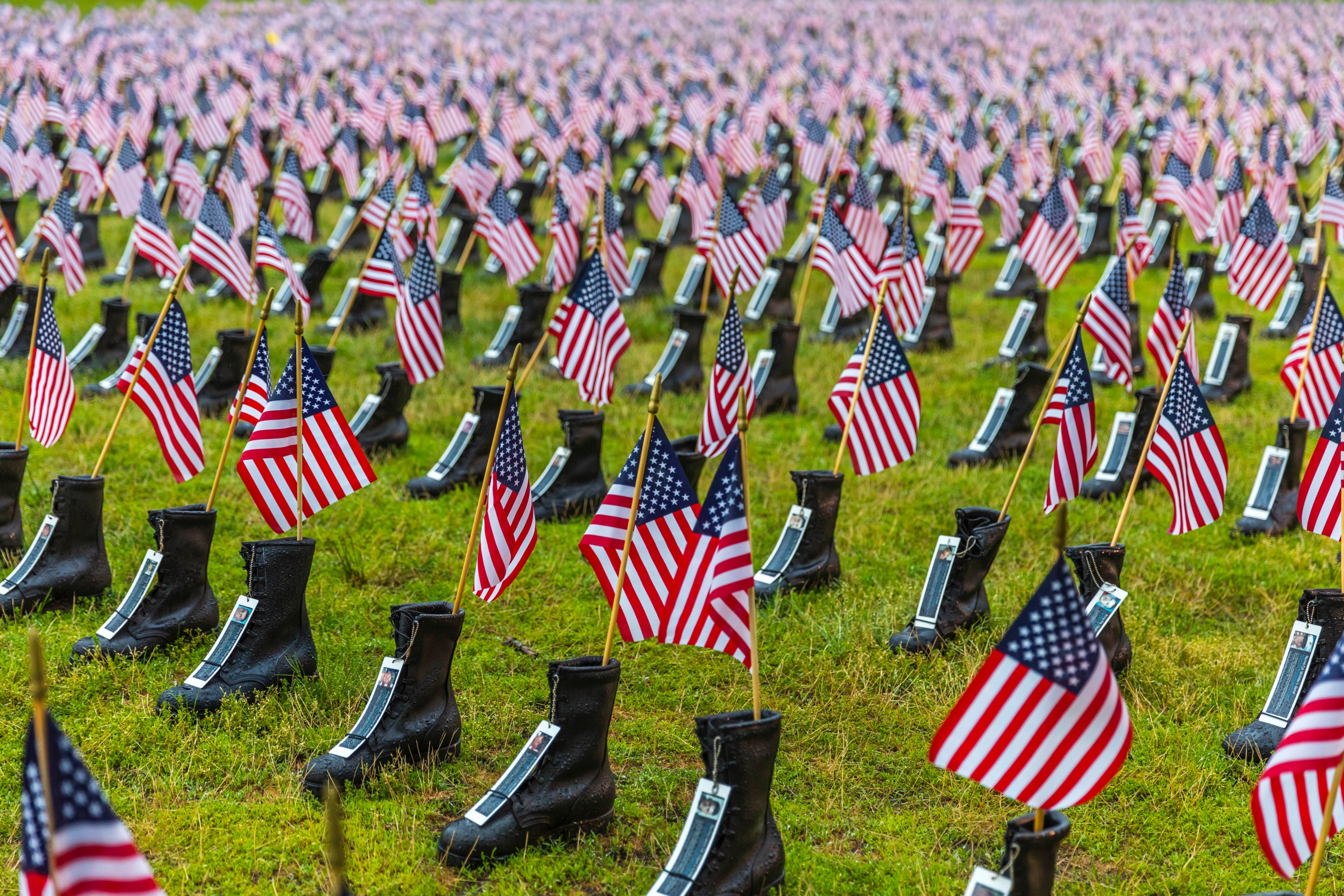 a memorial display of rows of boots with american flags in them at roger williams park, boots on the ground 4k, HD Wallpaper